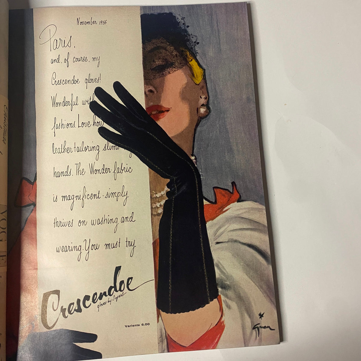 Advertisement page from Vogue Magazine November 15, 1955 showcasing Crescendo fabric, featuring an elegant illustration of a woman in gloves.