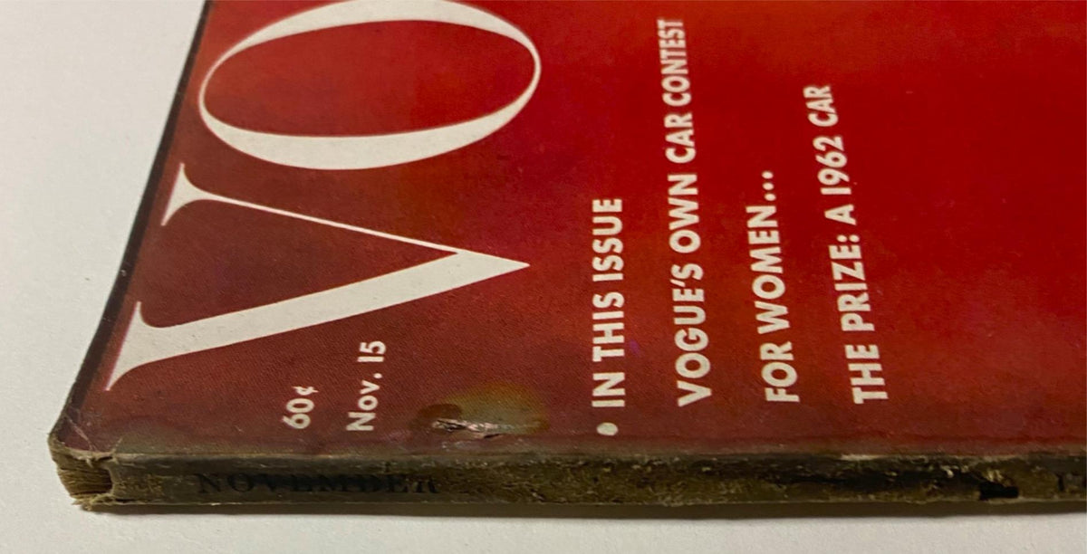 Detailed view of the cover's spine from Vogue Magazine, November 15, 1961 featuring Sondra Peterson, showcasing wear and condition.