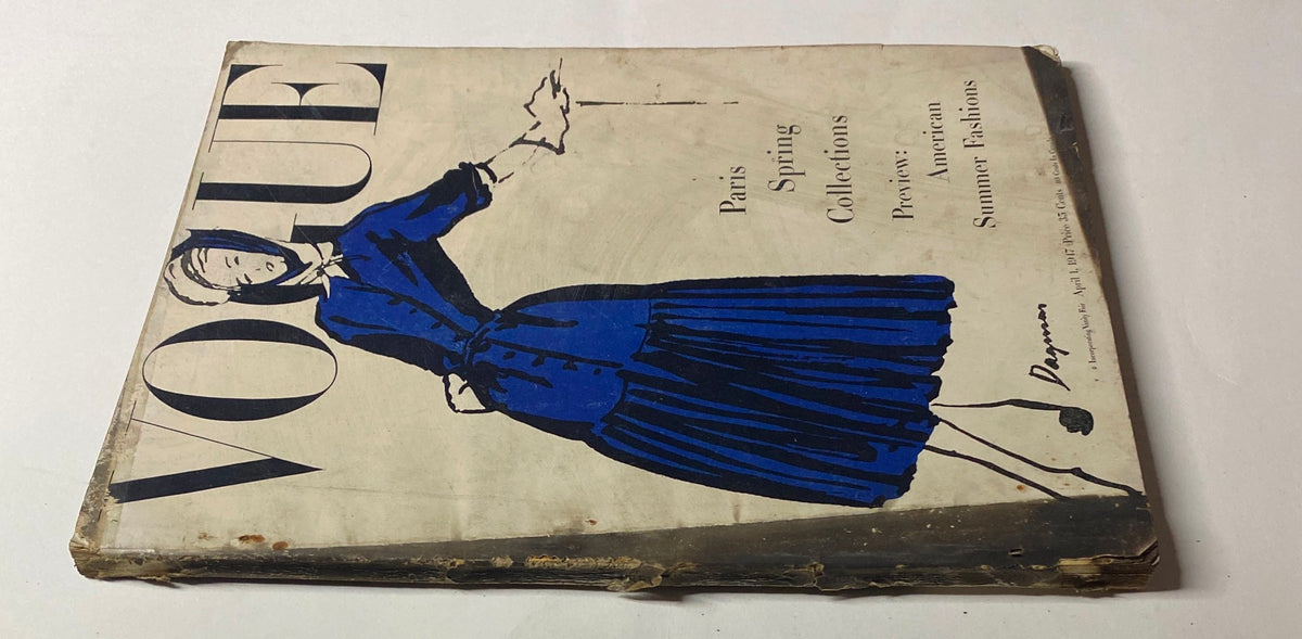 Cover of Vogue Magazine April 1, 1947 featuring a fashion illustration in blue, showcasing Paris Spring Collections and American Summer Fashions.