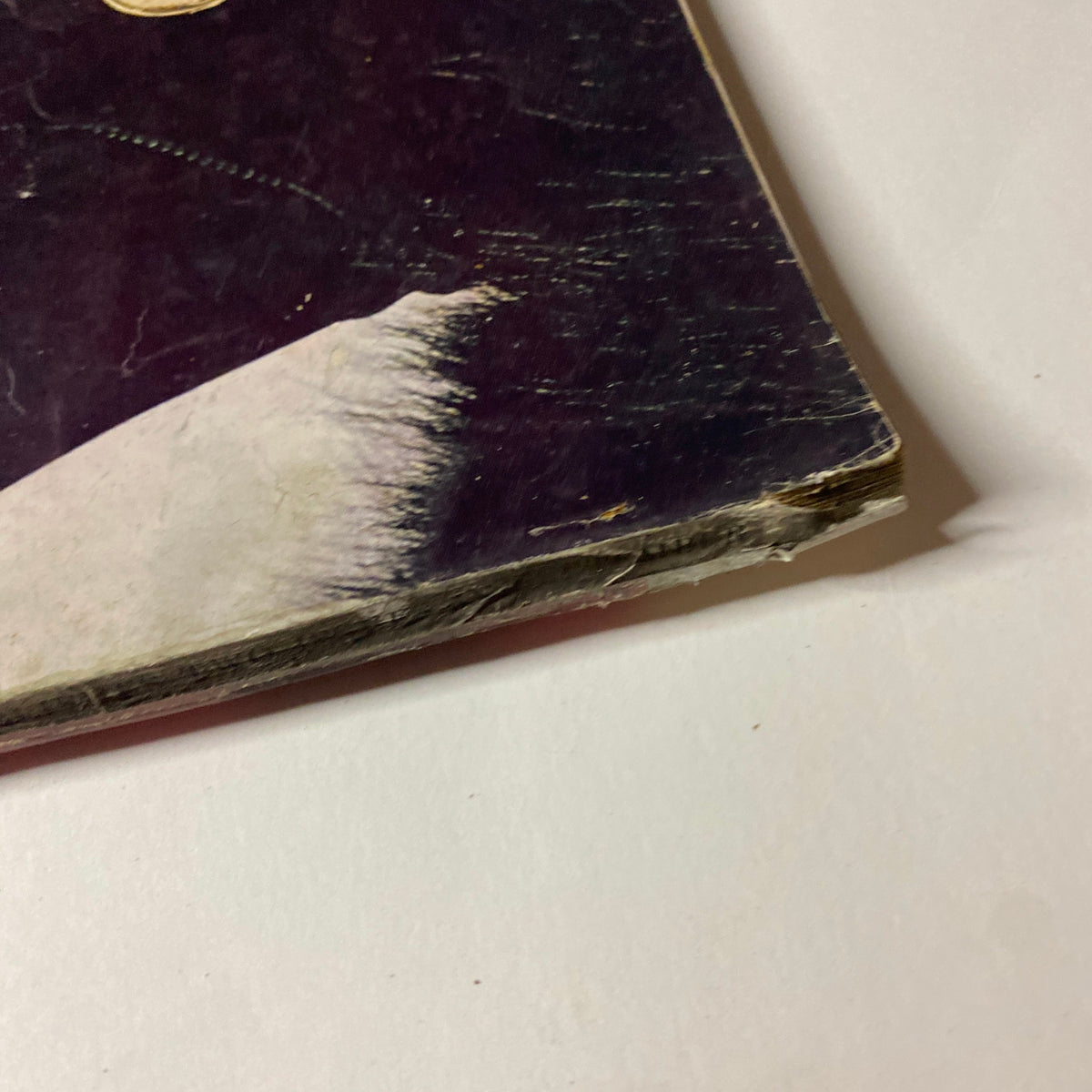 Close-up of the side of Vogue Magazine September 15, 1962, showing wear and tear indicative of its vintage nature, reflecting its historical significance in fashion.