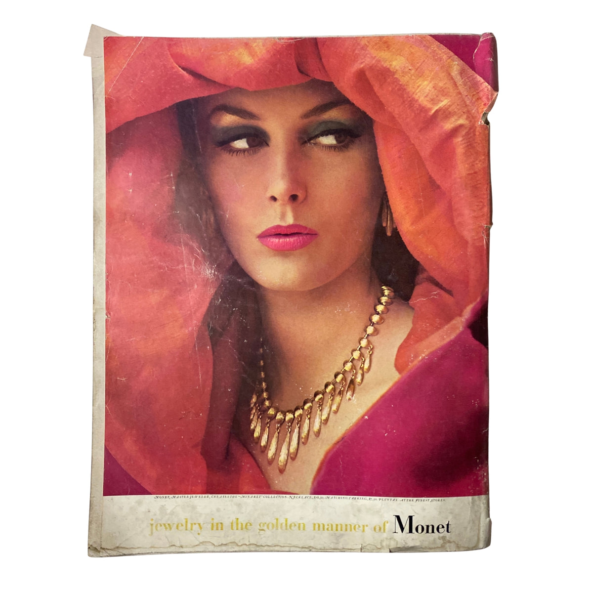 Cover image featuring a glamorous model from the Vogue Magazine September 15, 1962 titled 'The Blaze in Fashion', adorned with jewelry and a striking headpiece.