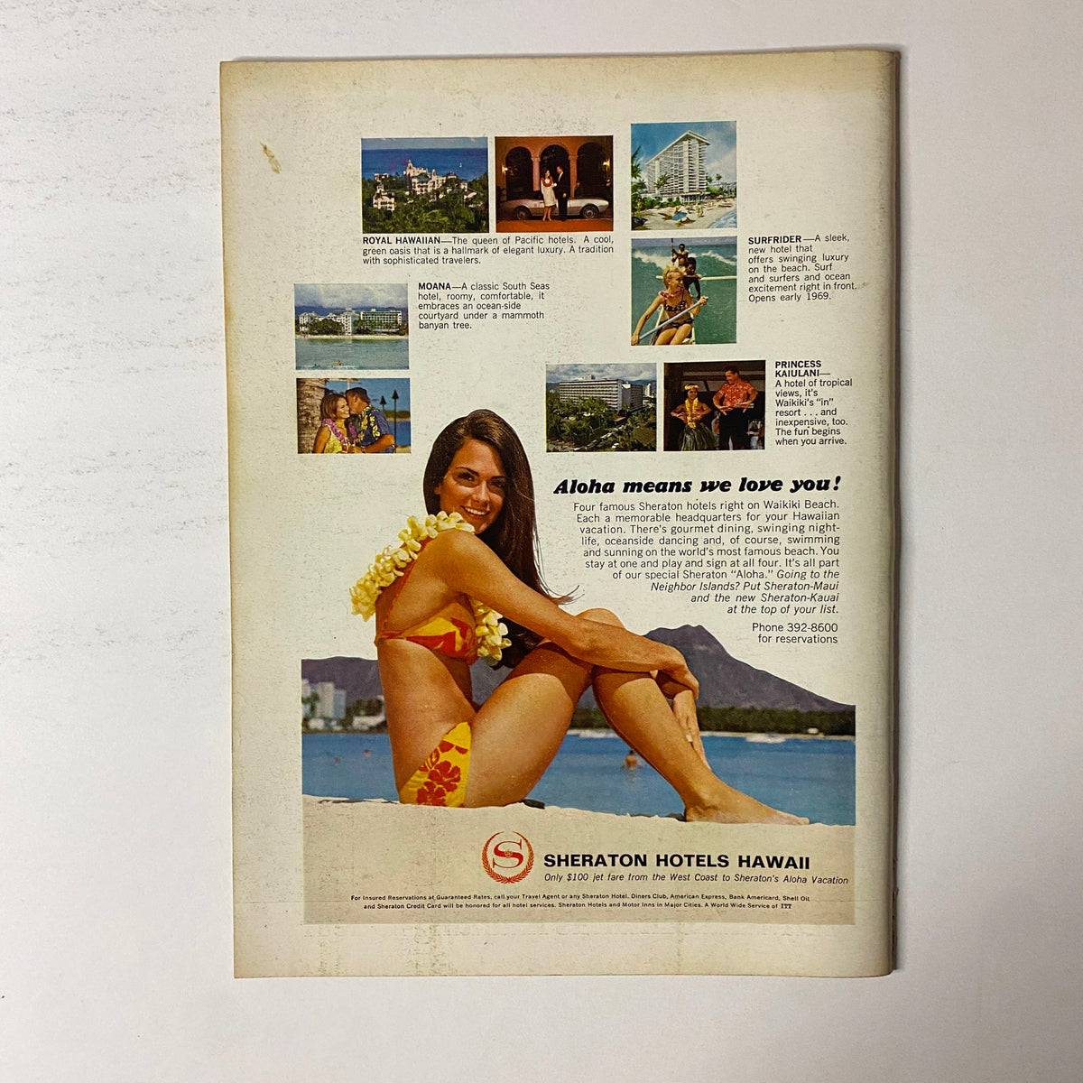 Back cover of The New Yorker Full Magazine January 4, 1969, featuring an advertisement for Sheraton Hotels Hawaii with a model in a bikini, promoting Hawaiian vacations.