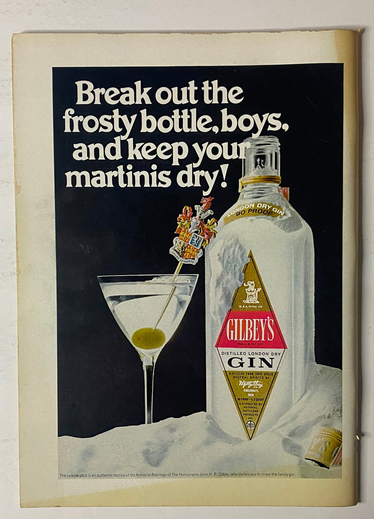 Gilbey's gin advertisement featuring a frosty bottle and a martini glass with an olive, from The New Yorker Full Magazine March 28, 1970 Ilonka Karasz Cover.