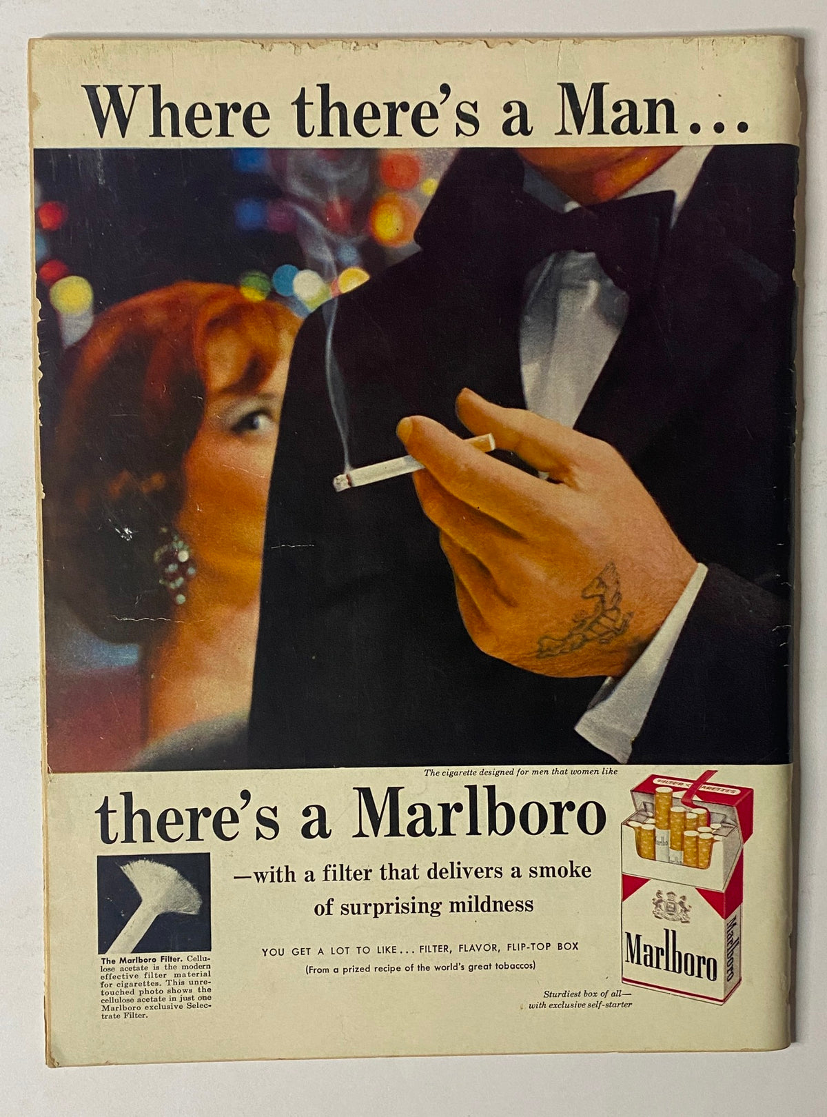 Vintage advertisement for Marlboro featuring a well-dressed man holding a cigarette, part of The New Yorker Full Magazine March 1, 1958, illustrating mid-century marketing and design.