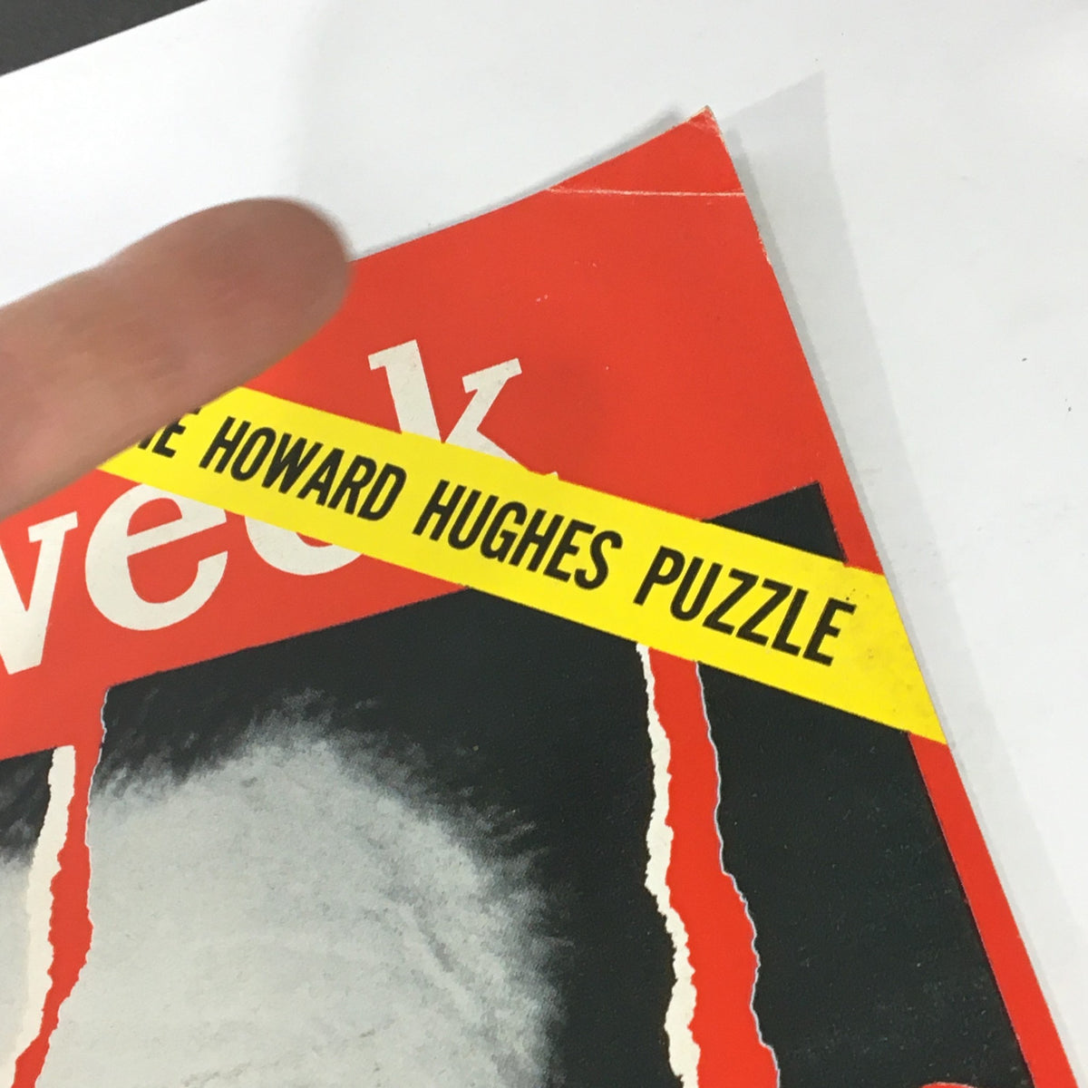 Close-up of the VTG Newsweek Magazine January 15 1968, highlighting the yellow band labeled 'THE HOWARD HUGHES PUZZLE' across the top.