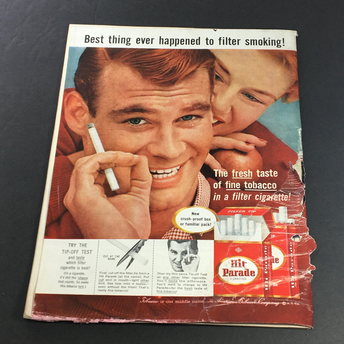 Back cover of the VTG Newsweek Magazine September 23 1957 showcasing an advertisement for Hit Parade cigarettes, featuring a smiling couple.