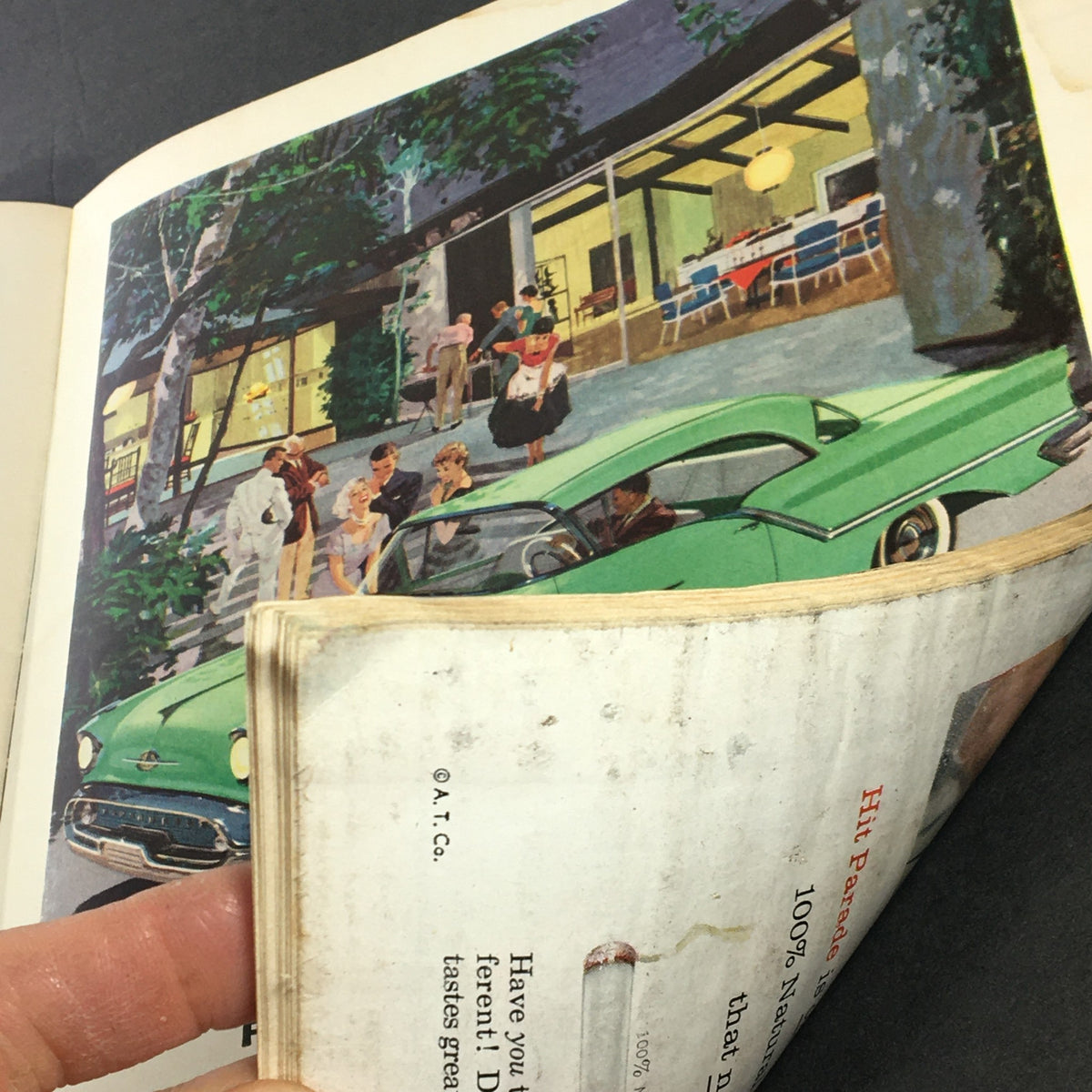 An interior page from the VTG Newsweek Magazine June 3, 1957, depicting a colorful scene with people by a green car and the mention of advertisements.