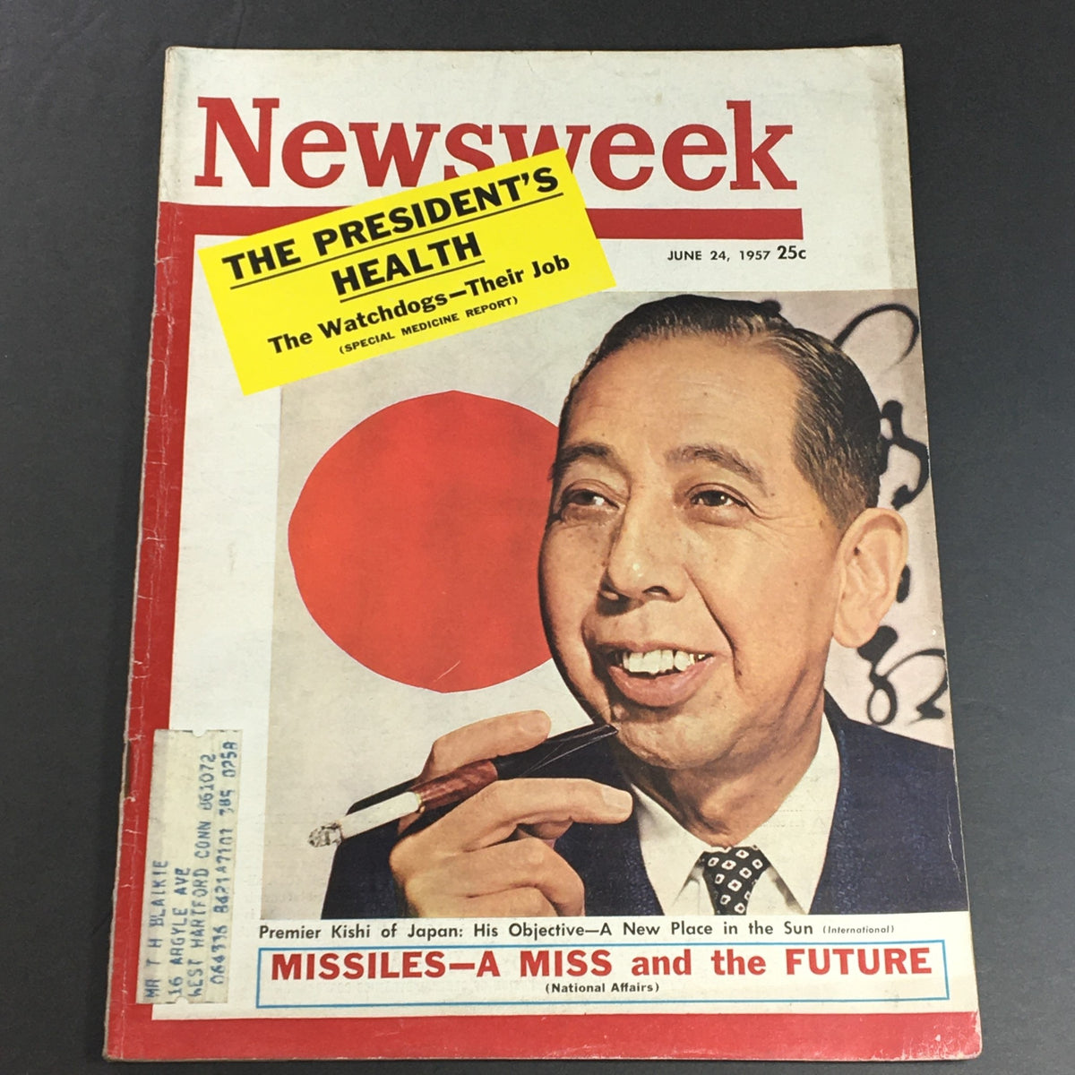 Cover of VTG Newsweek Magazine from June 24, 1957 featuring Premier Kishi of Japan, showcasing historical insights and a distinctive red and white design.