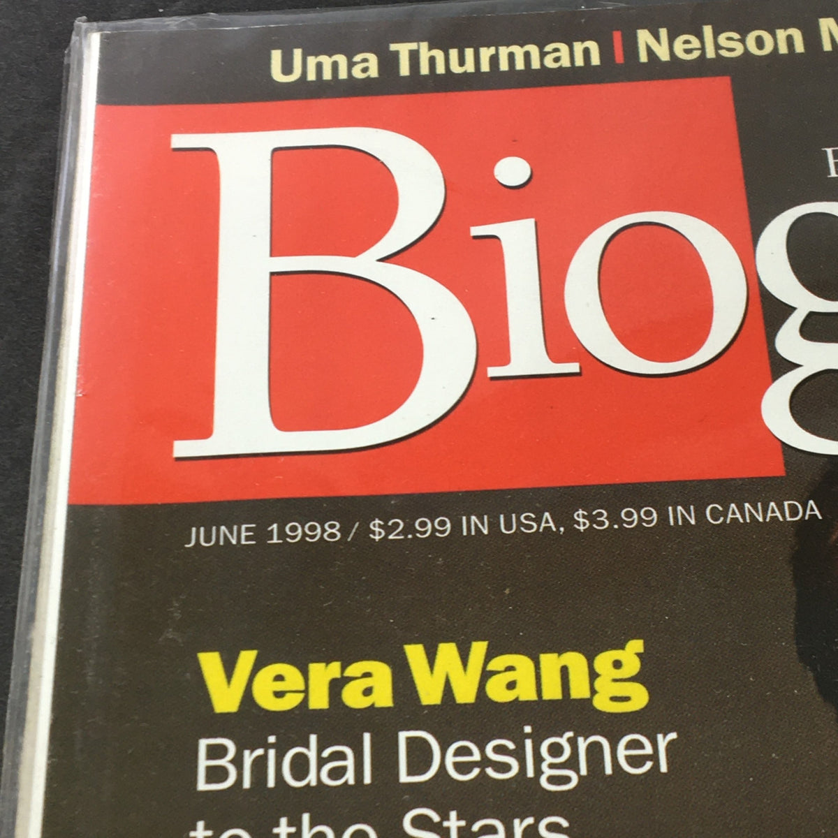 Close-up of the title section of Biography Magazine June 1998, prominently displaying the magazine's title and notable names including Uma Thurman.