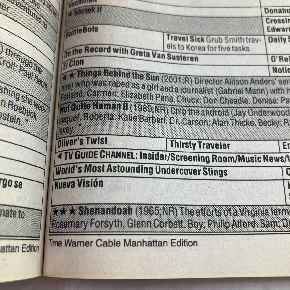TV Guide Magazine August 17 2002 Elvis Presley Legacy Time Warner Manhattan Edition interior page containing listings and articles about Elvis, highlighting TV Guide Channel features and entertainment news.
