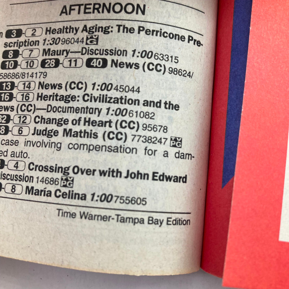 Interior page from TV Guide Magazine, August 17 2002, showcasing the TV schedule and programming lineup for the day. This is part of the Time Warner-Tampa Bay edition.
