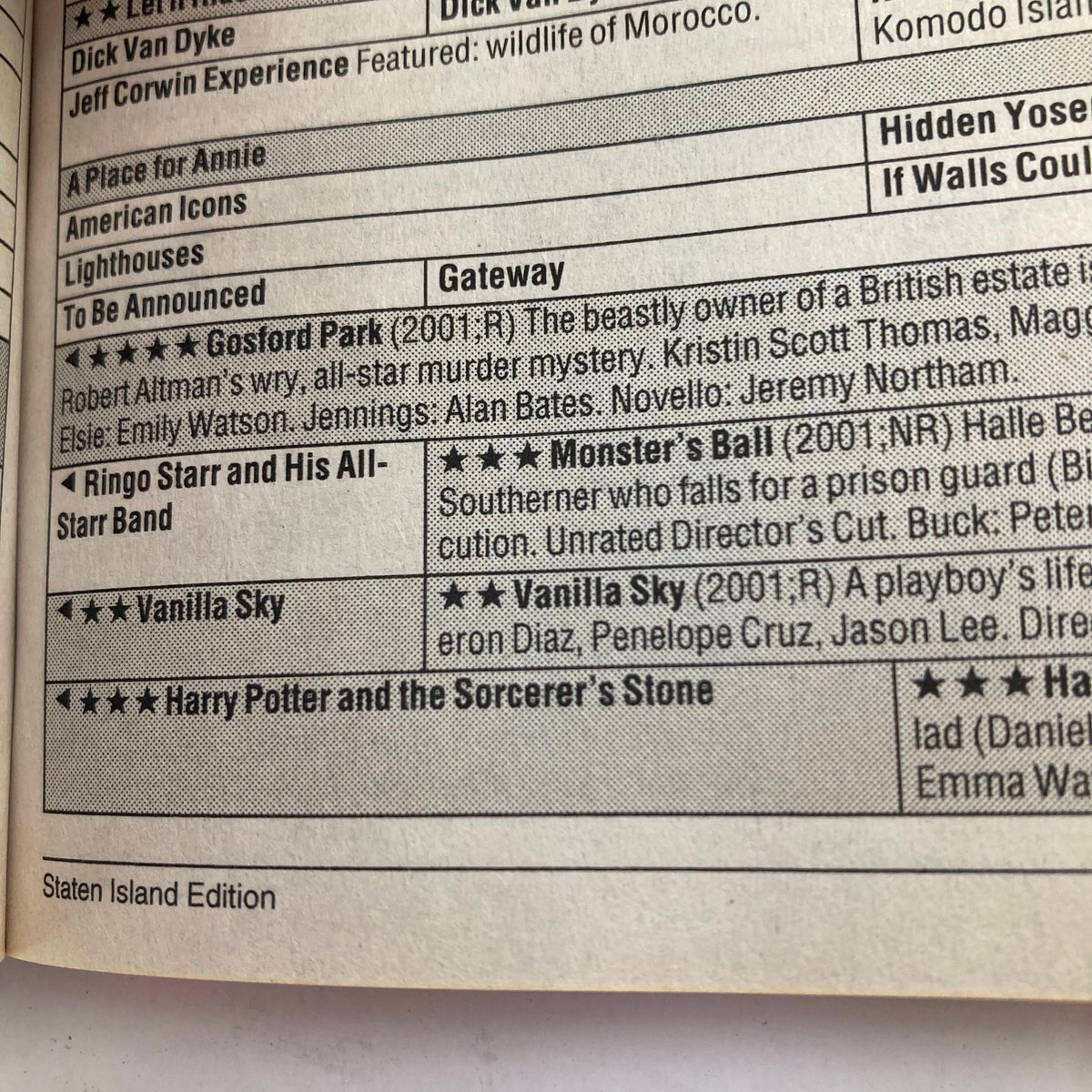 Inside spread of the TV Guide Magazine August 17 2002 featuring listings for upcoming shows, including titles like 'Harry Potter and the Sorcerer's Stone' and 'Vanilla Sky,' showcasing the entertainment landscape of that era.
