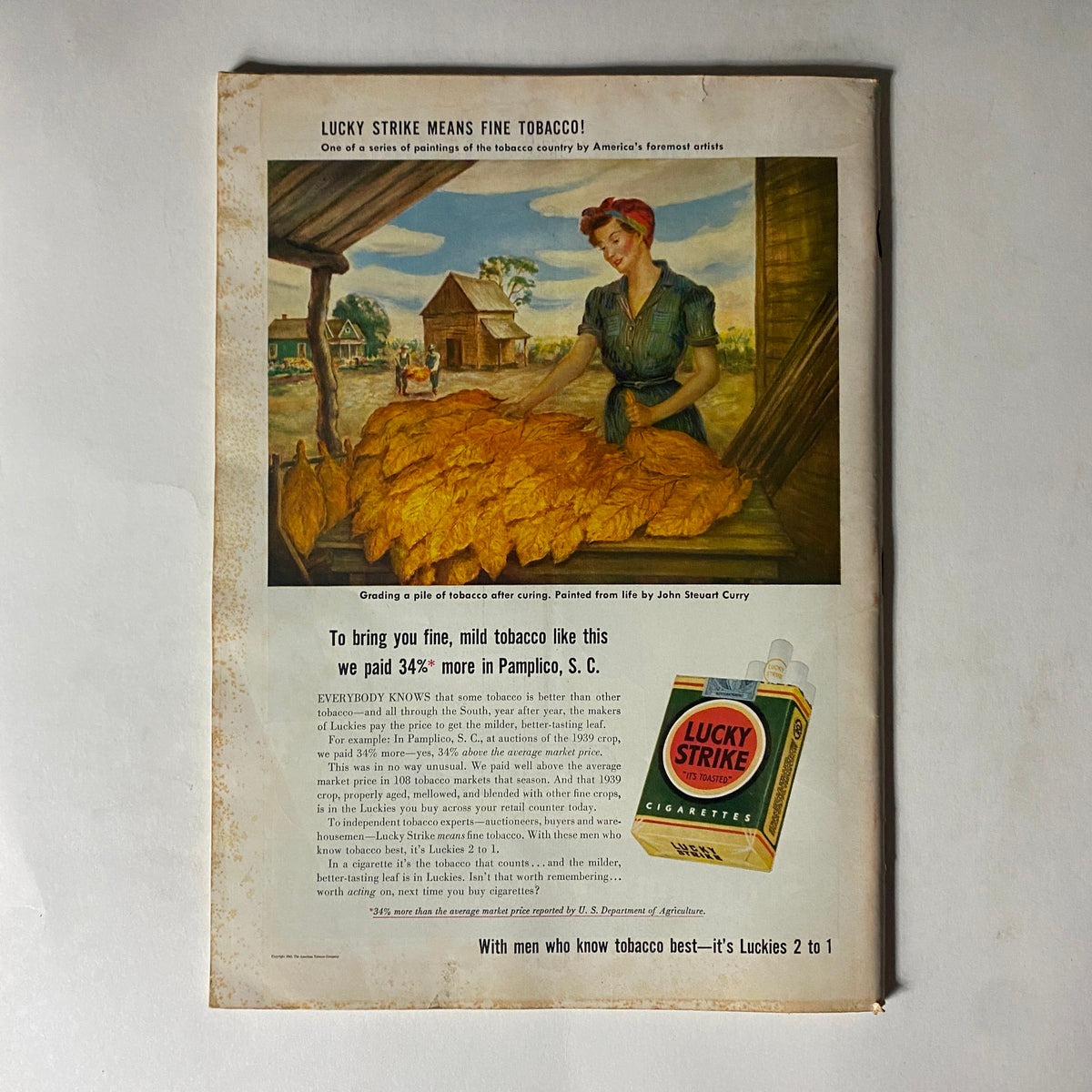 Back cover of the VTG Time Magazine May 11, 1942, featuring an advertisement for Lucky Strike cigarettes with an illustration of a woman grading tobacco, reflecting vintage advertising style.