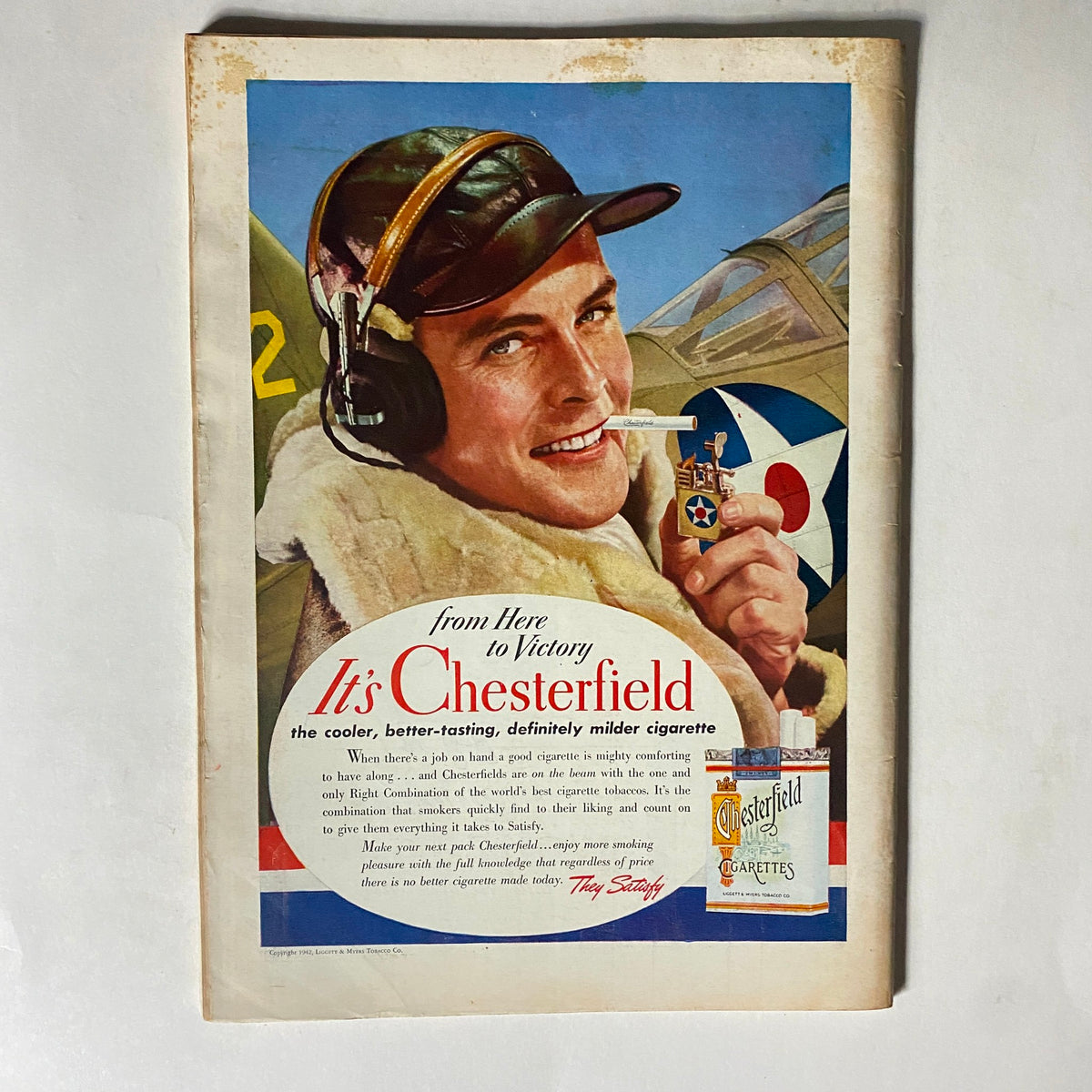 Advertisement page from Time Magazine September 14, 1942 for Chesterfield cigarettes, showcasing a pilot promoting the brand during the war era.