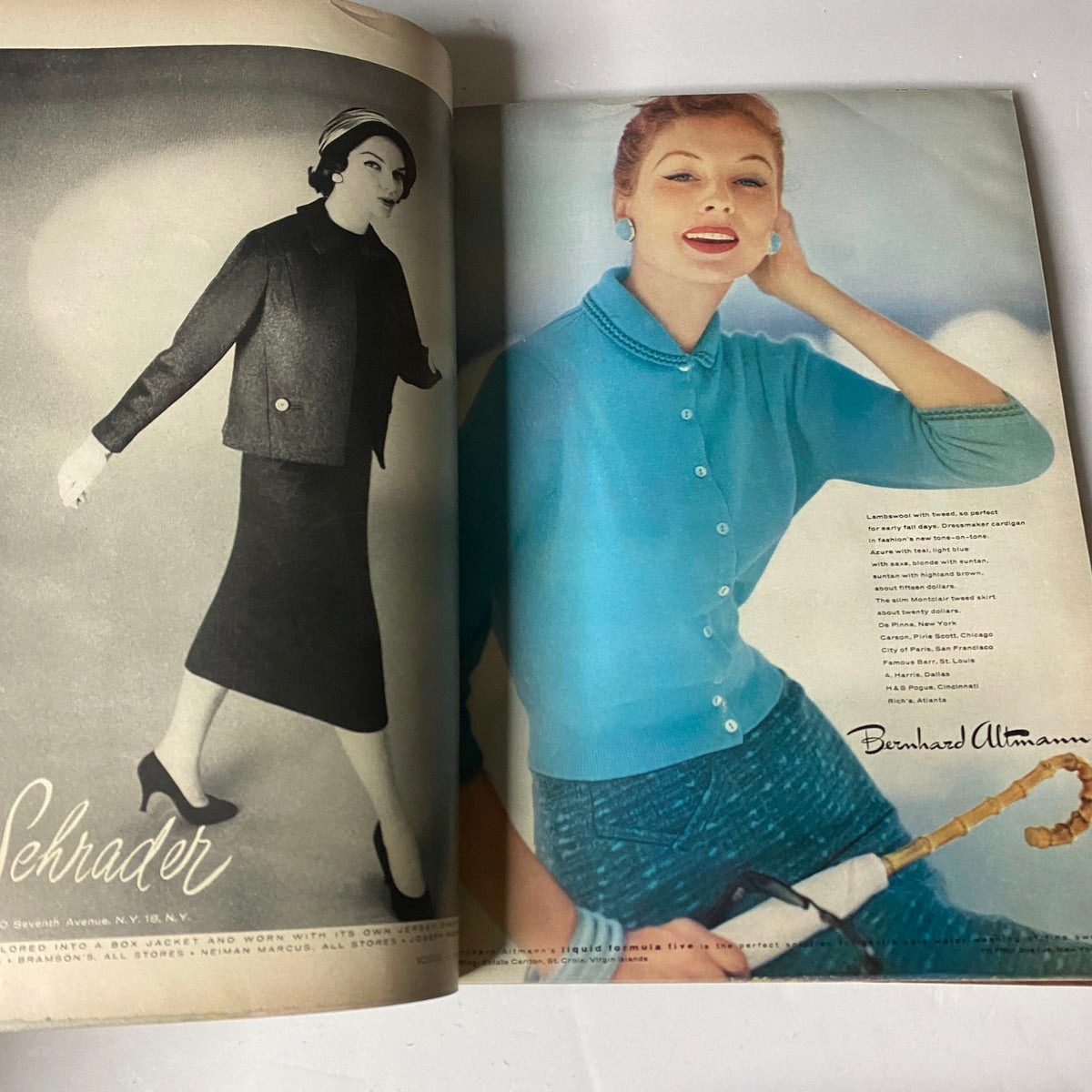 Fashion spread from Vogue Magazine September 1, 1957 presenting models in stylish outfits, featuring a sophisticated black jacket and a turquoise sweater, illustrating 1950s fashion aesthetics.