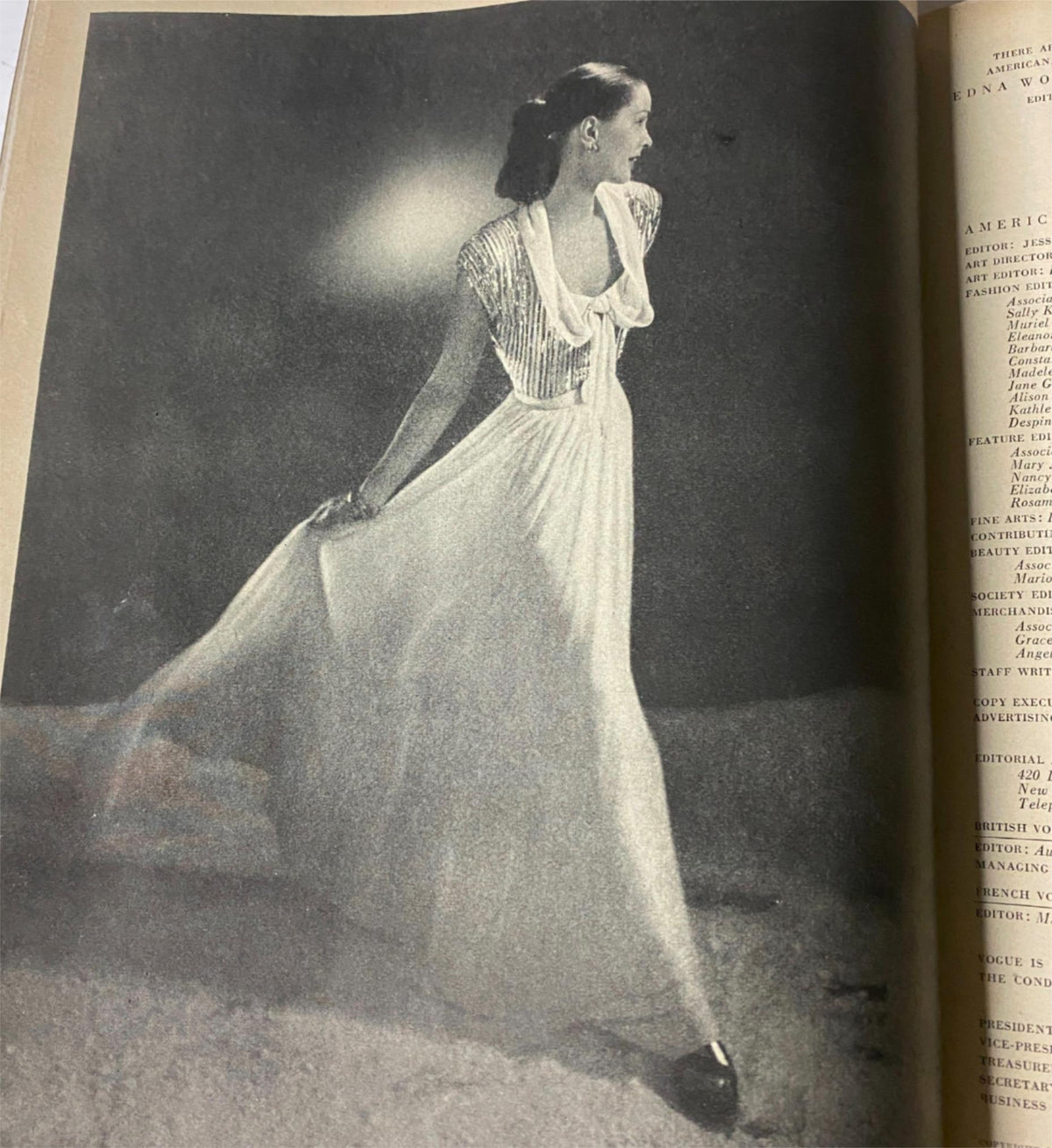 Vogue Magazine December 15, 1946 showcasing a woman in a flowing dress, embodying grace and sophistication typical of post-war fashion trends, capturing the essence of 1940s style.