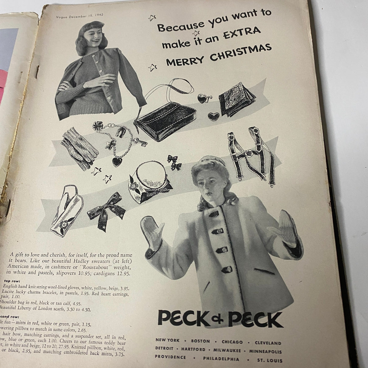 Advertisement in Vogue Magazine, December 15, 1942, promoting Christmas gift ideas with a woman wearing a winter coat.