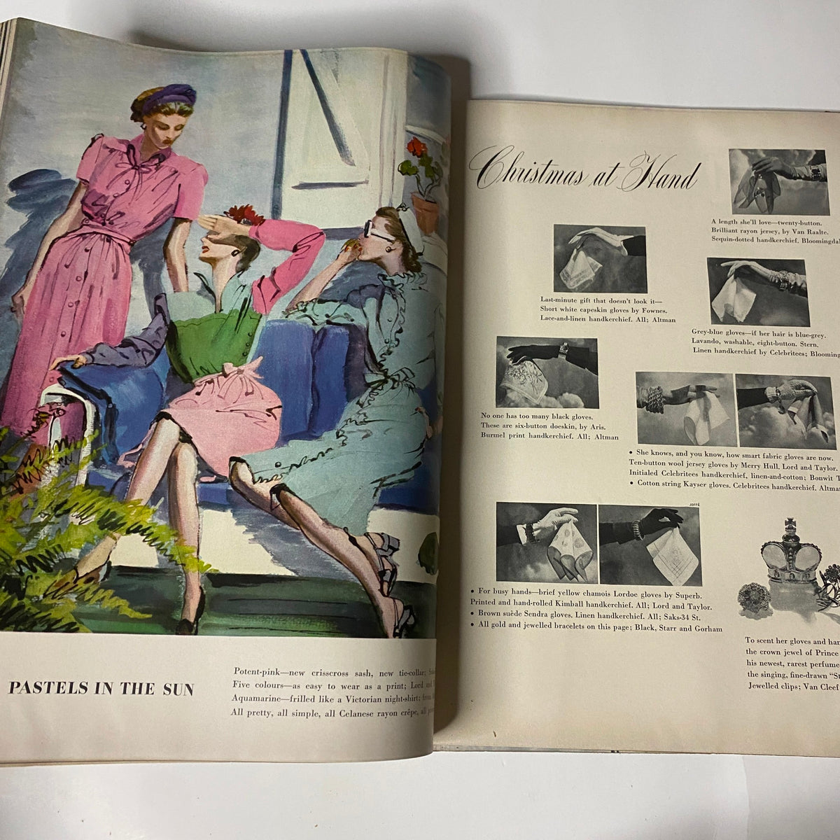 Fashion illustration from Vogue Magazine, December 15, 1942, showcasing pastel dresses with a title reading 'Christmas at Hand'.