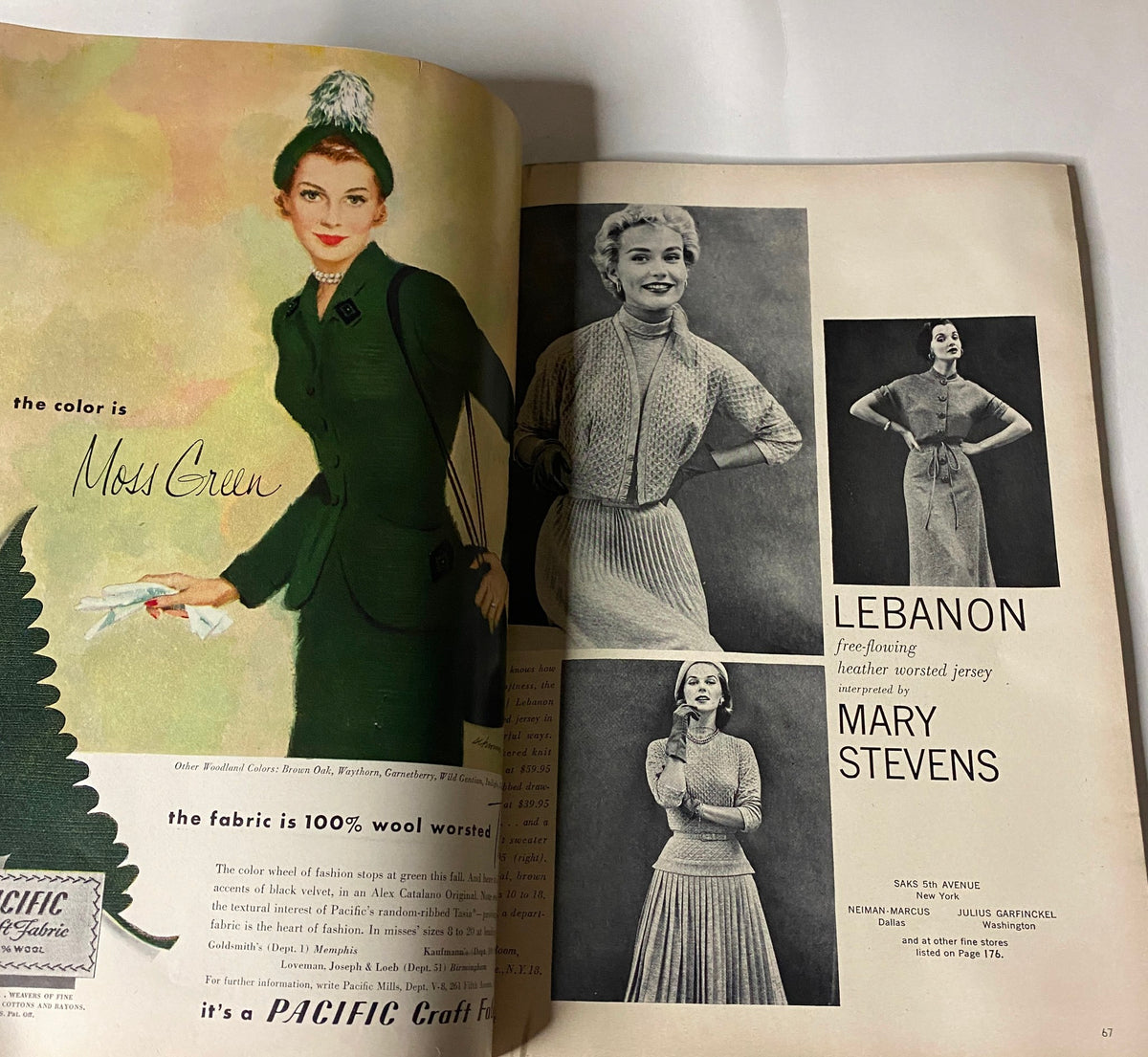 Vintage advertisement showcasing 'Moss Green' fabric for a wool worsted dress in Vogue Magazine August 15, 1952, featuring models and styling options.