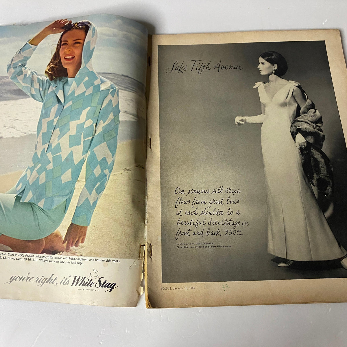 Vogue Magazine January 15, 1964 featuring a model in a patterned hooded beach shirt by White Stag, showcasing early 1960s fashion designs.