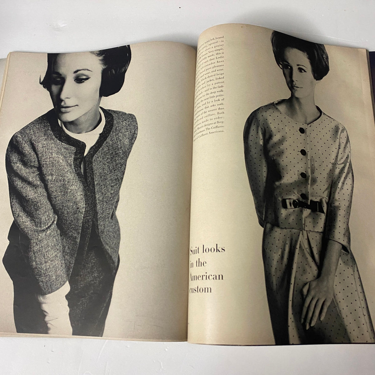Vogue Magazine March 1, 1963 Anne De Zogheb Cover by Irving Penn showcasing a black and white photo of a model in a fitted suit on the left and a dotted dress on the right, highlighting American fashion trends.