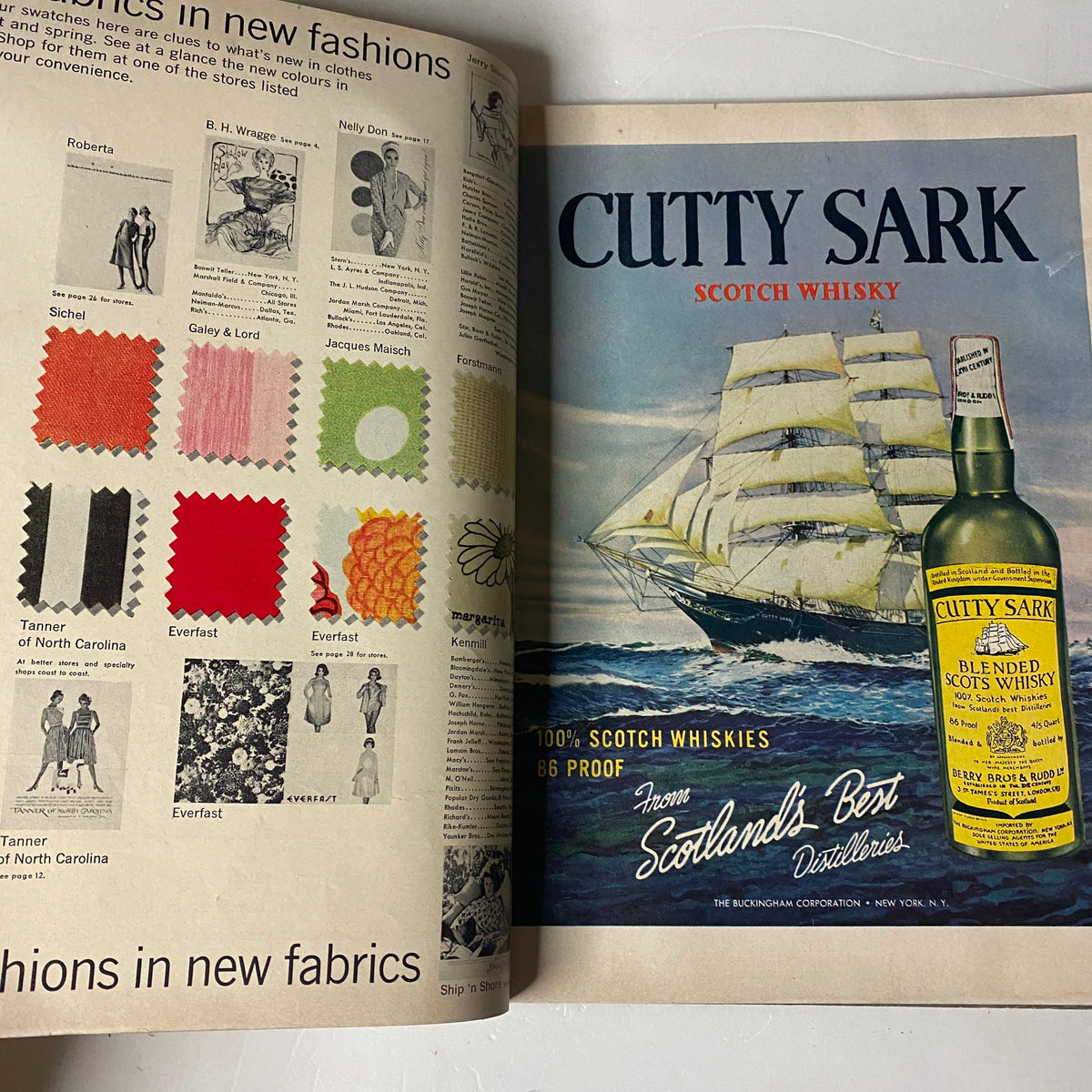 Inside spread of Vogue Magazine January 1, 1962 featuring a Cutty Sark Scotch Whisky advertisement and fabric swatches.