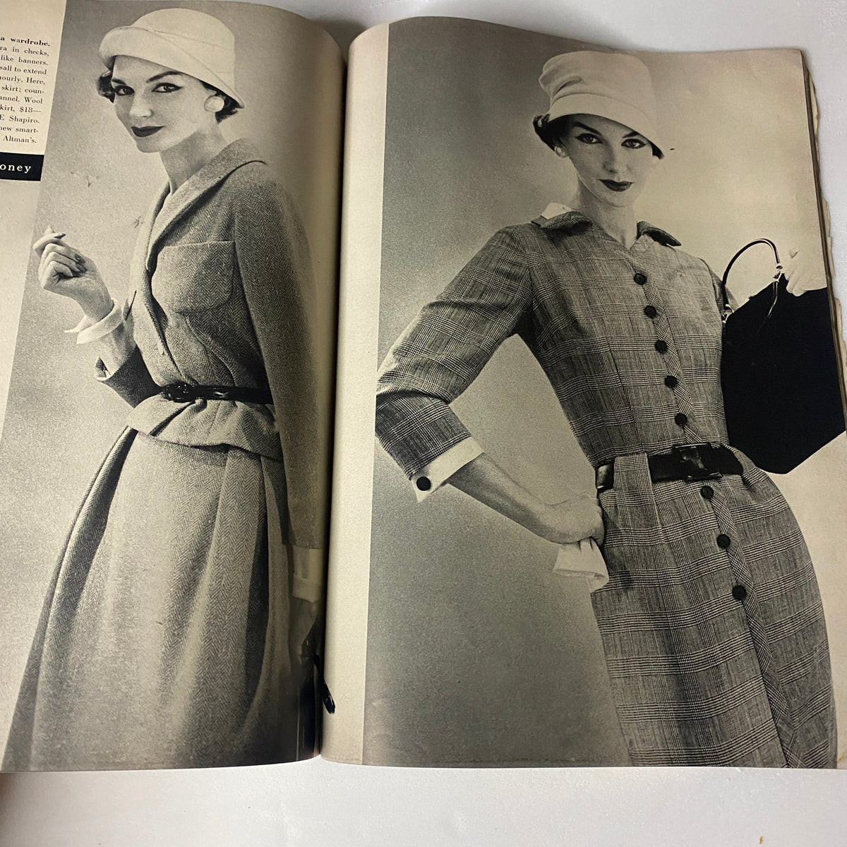 Vogue Magazine February 15, 1957 featuring Anne St. Marie by Karen Radkai, displaying a monochrome fashion spread with models showcasing tailored dresses and accessories, reflecting 1950s elegance.