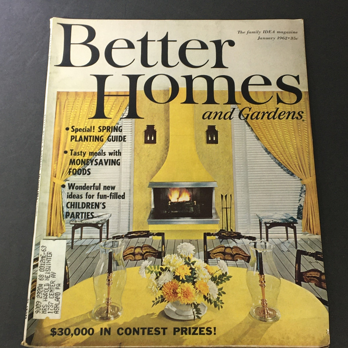 Cover of VTG Better Homes & Gardens Magazine January 1962 Spring Planting Guide Special featuring a cozy home interior with a yellow theme and a dining table with flowers.