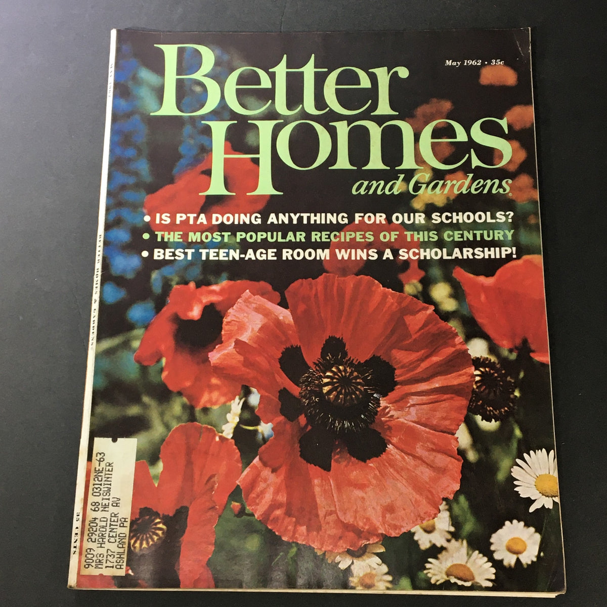 Cover of VTG Better Homes & Gardens May 1962 issue featuring vibrant poppy flowers, highlighting the most popular recipes of this century.