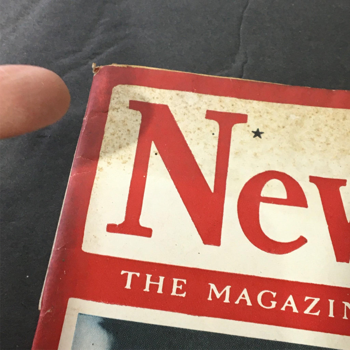 Detailed view of the vintage Newsweek magazine from September 13, 1943, highlighting the magazine title and minor wear, showcasing its collectible nature and connection to historical events.