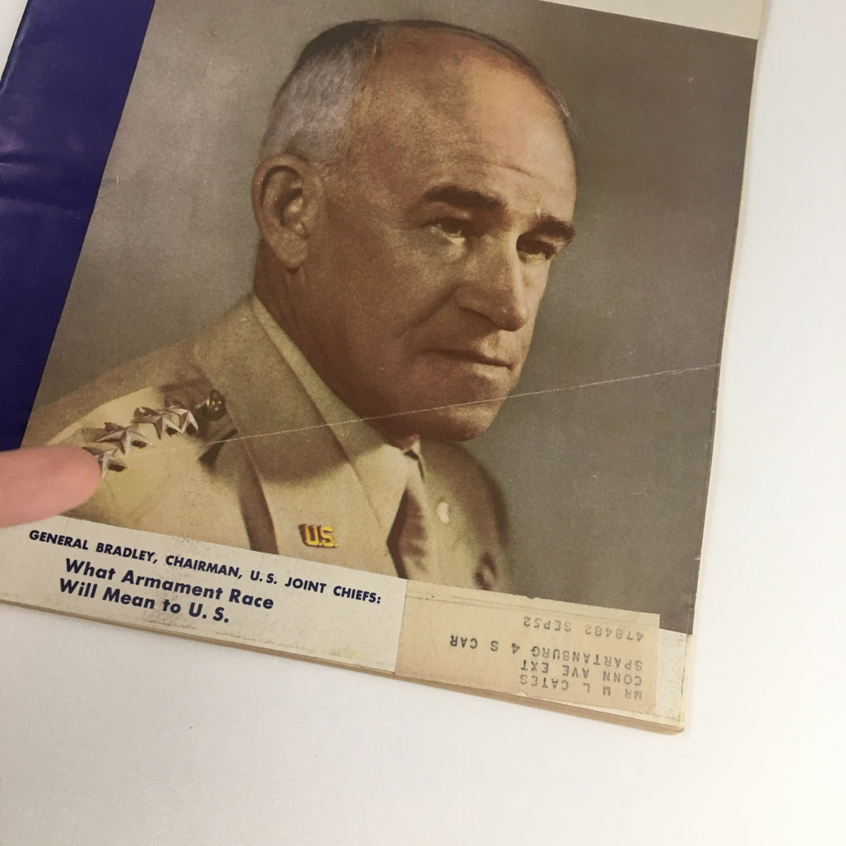 Detailed close-up of the cover of VTG U.S. News & World Report October 1949, showcasing General Bradley, including text about armament race implications.