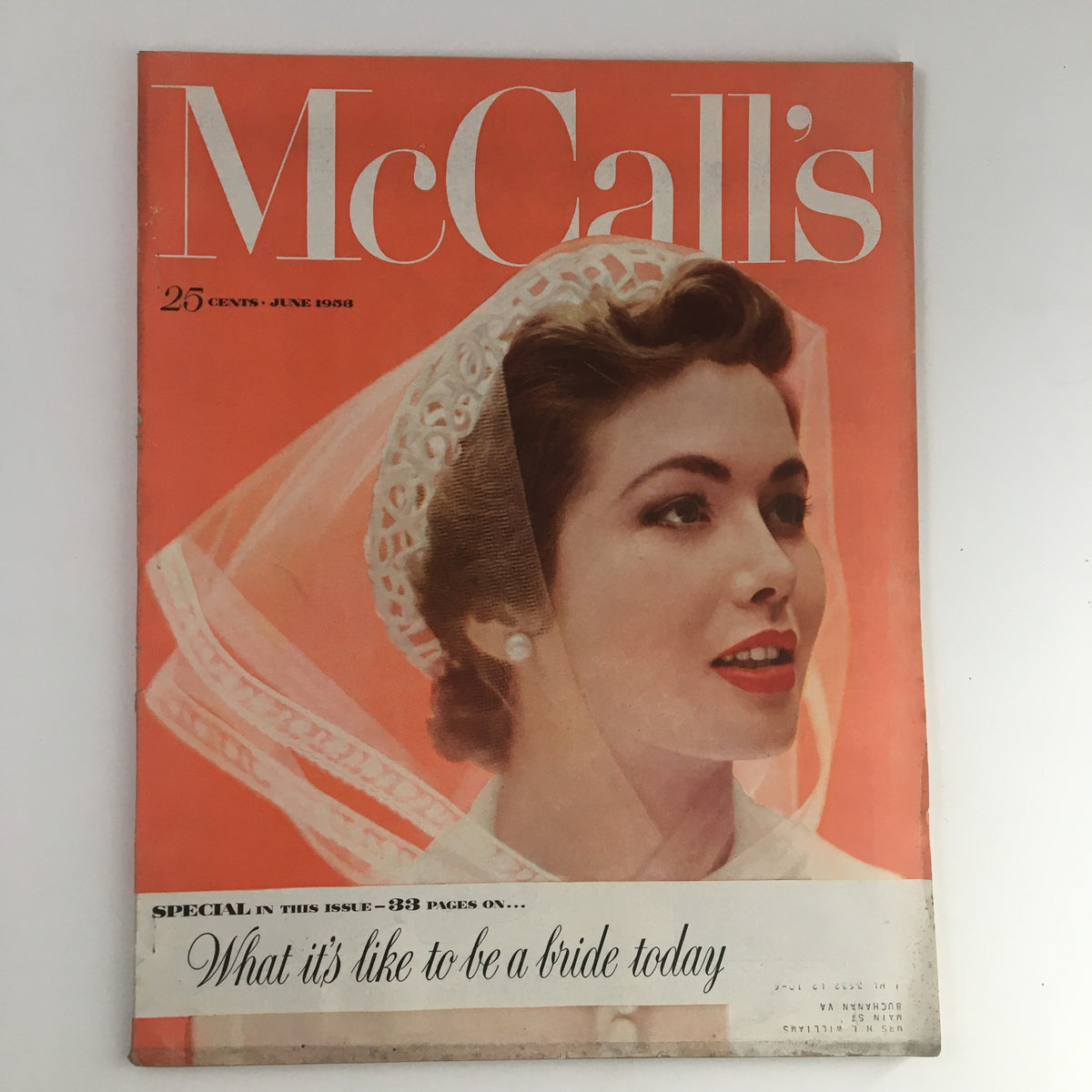 Cover of VTG McCall's Magazine June 1953 featuring a bride in a veil with the title 'What is Like To Be A Bride Today Special Issue'.