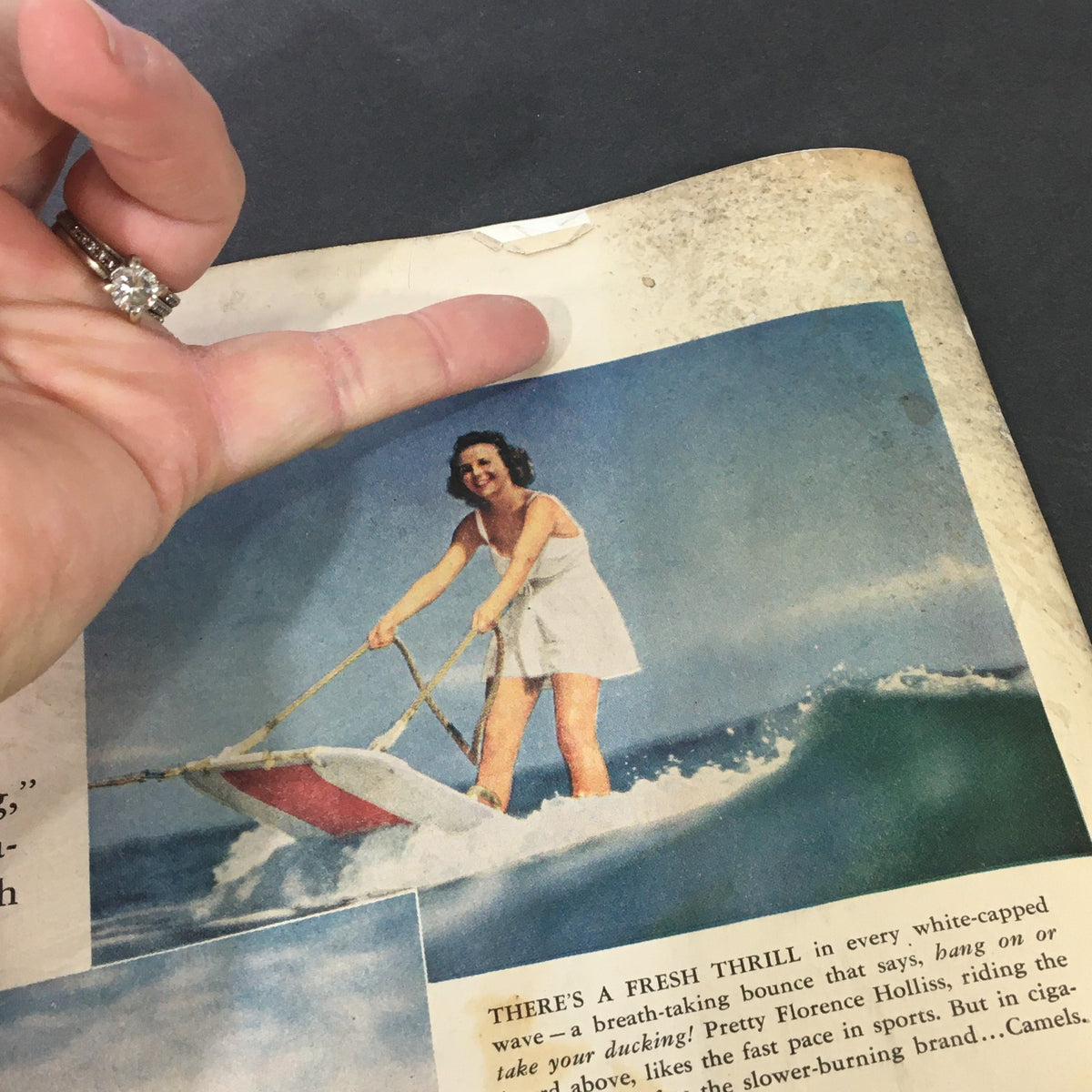Close-up image from VTG Collier's Magazine July 27 1940 showcasing a woman in a white dress water skiing, illustrating the era's leisure activities.