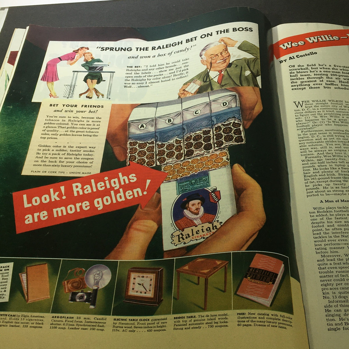 VTG Collier's Magazine November 8 1941 ad page illustrating a Raleigh cigarette advertisement with a colorful graphic and slogan, 'Look! Raleighs are more golden!'.