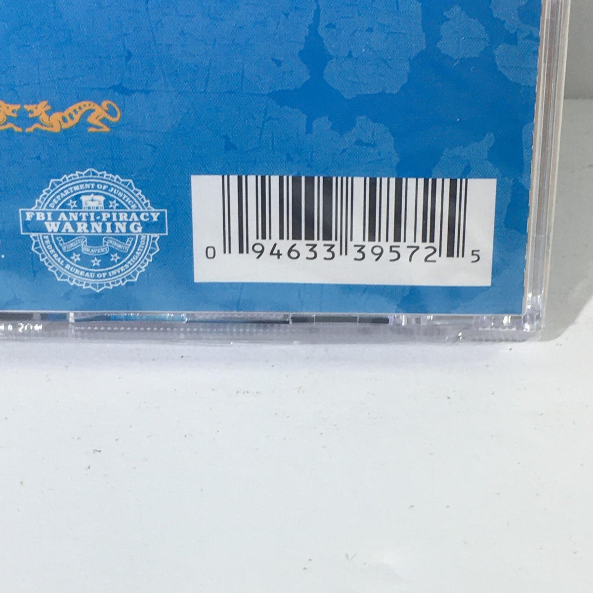 Barcode and anti-piracy information on the back of The Best of Snoop Dogg Music Audio CD.