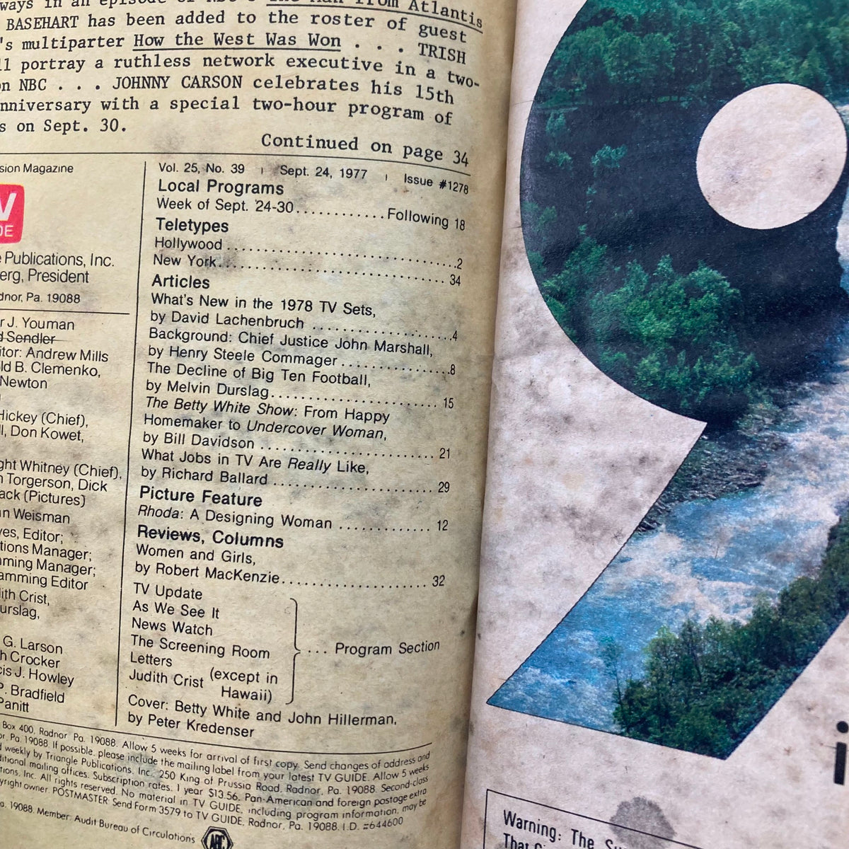 Inside page of TV Guide Magazine September 24, 1977, containing listings and articles including 'What's New in the 1978 TV Sets'. The page is marked with various program details and features from the magazine.