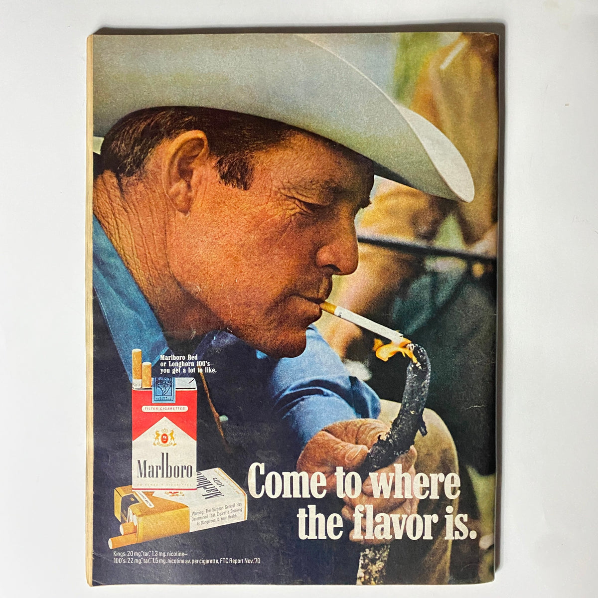 Advertisement from Hot Rod Magazine October 1971 showing a man smoking a Marlboro cigarette, emphasizing classic Americana.