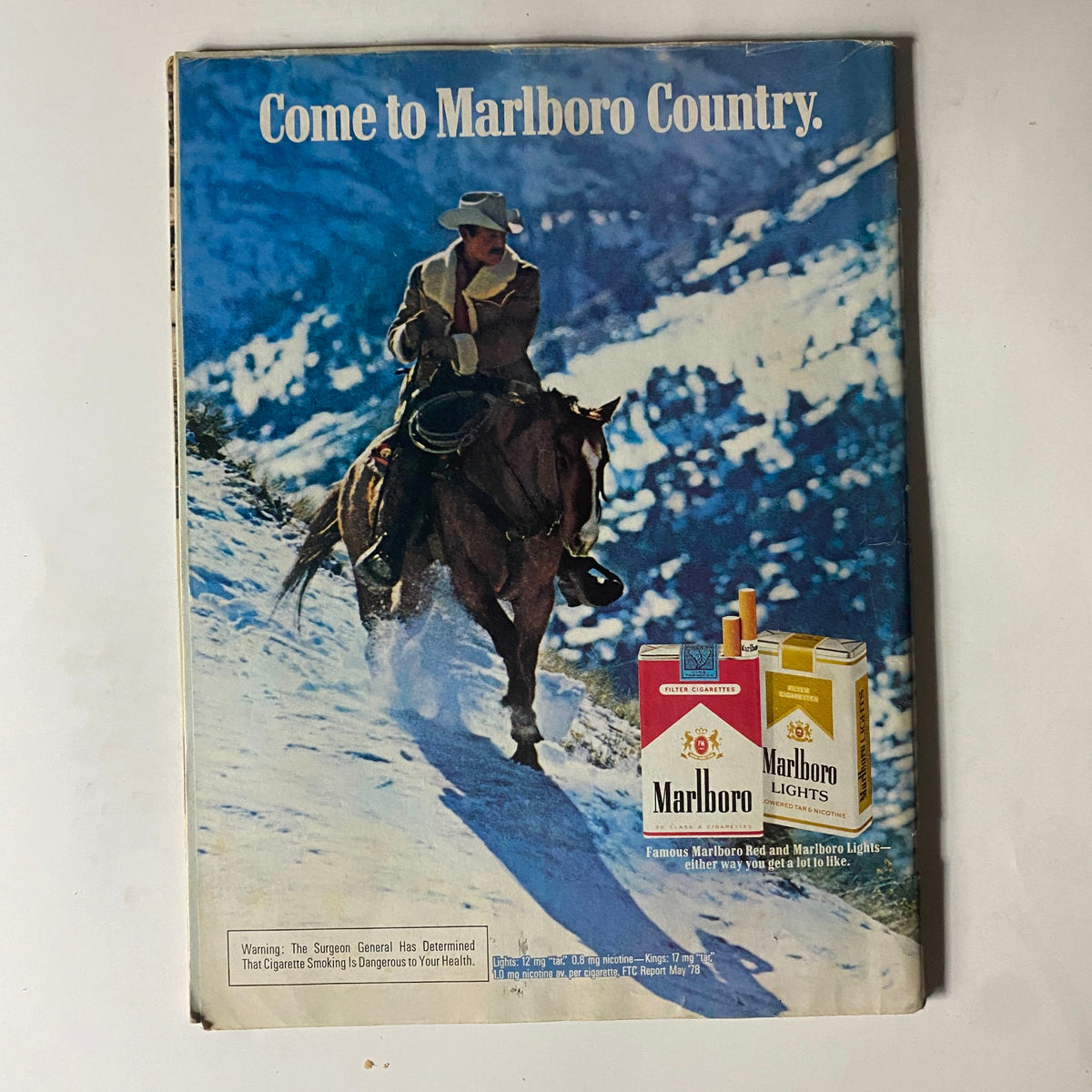 Back cover of VTG Motor Trend Magazine December 1979 featuring a Marlboro advertisement with a cowboy on horseback, emphasizing vintage branding and lifestyle imagery characteristic of the late 1970s automotive culture.