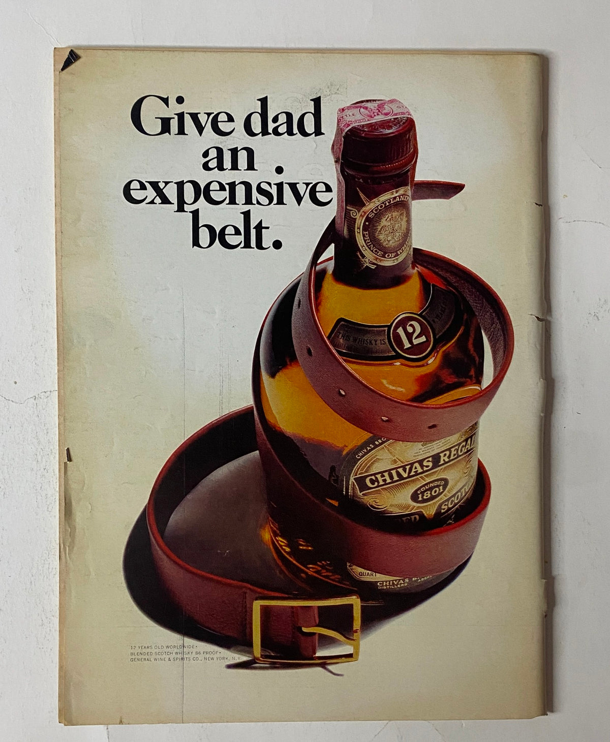 Advertisement from The New Yorker Full Magazine June 16, 1975 featuring a Chivas Regal whiskey bottle styled as an expensive belt.