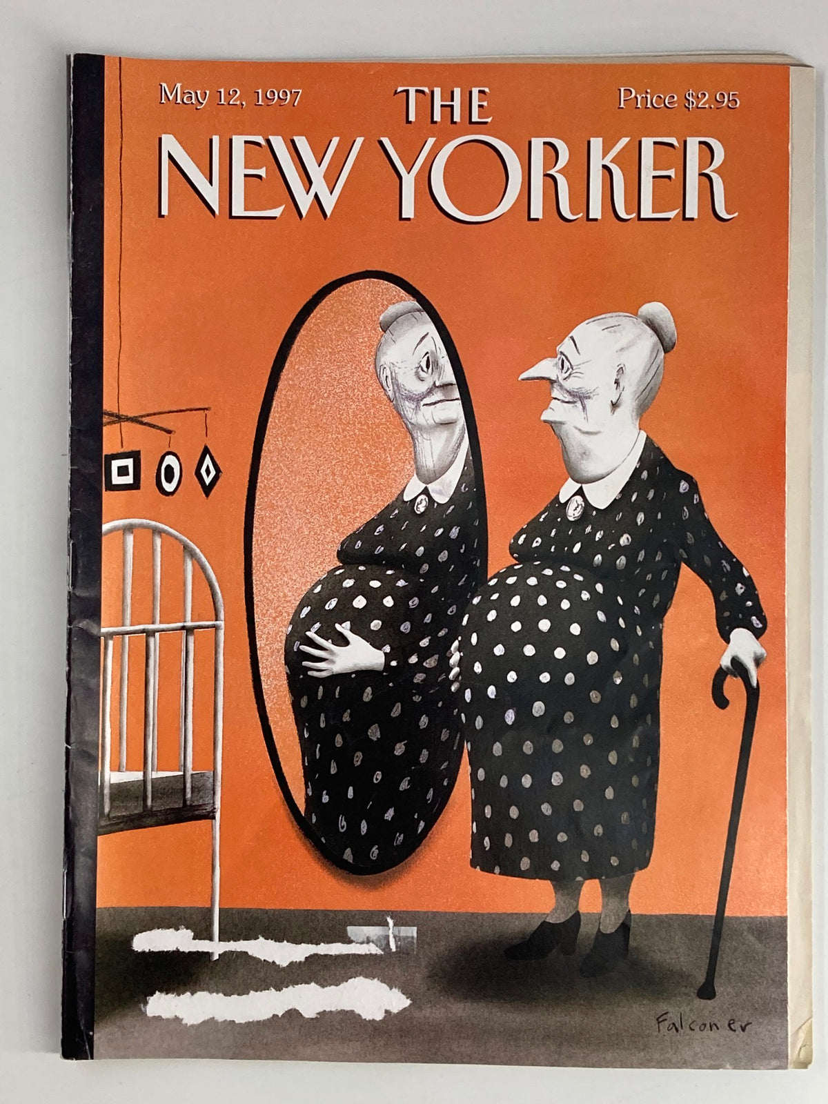 Cover of The New Yorker Full Magazine May 12, 1997, featuring a whimsical illustration by Ian Falconer depicting a pregnant woman looking into a mirror, symbolizing motherhood.