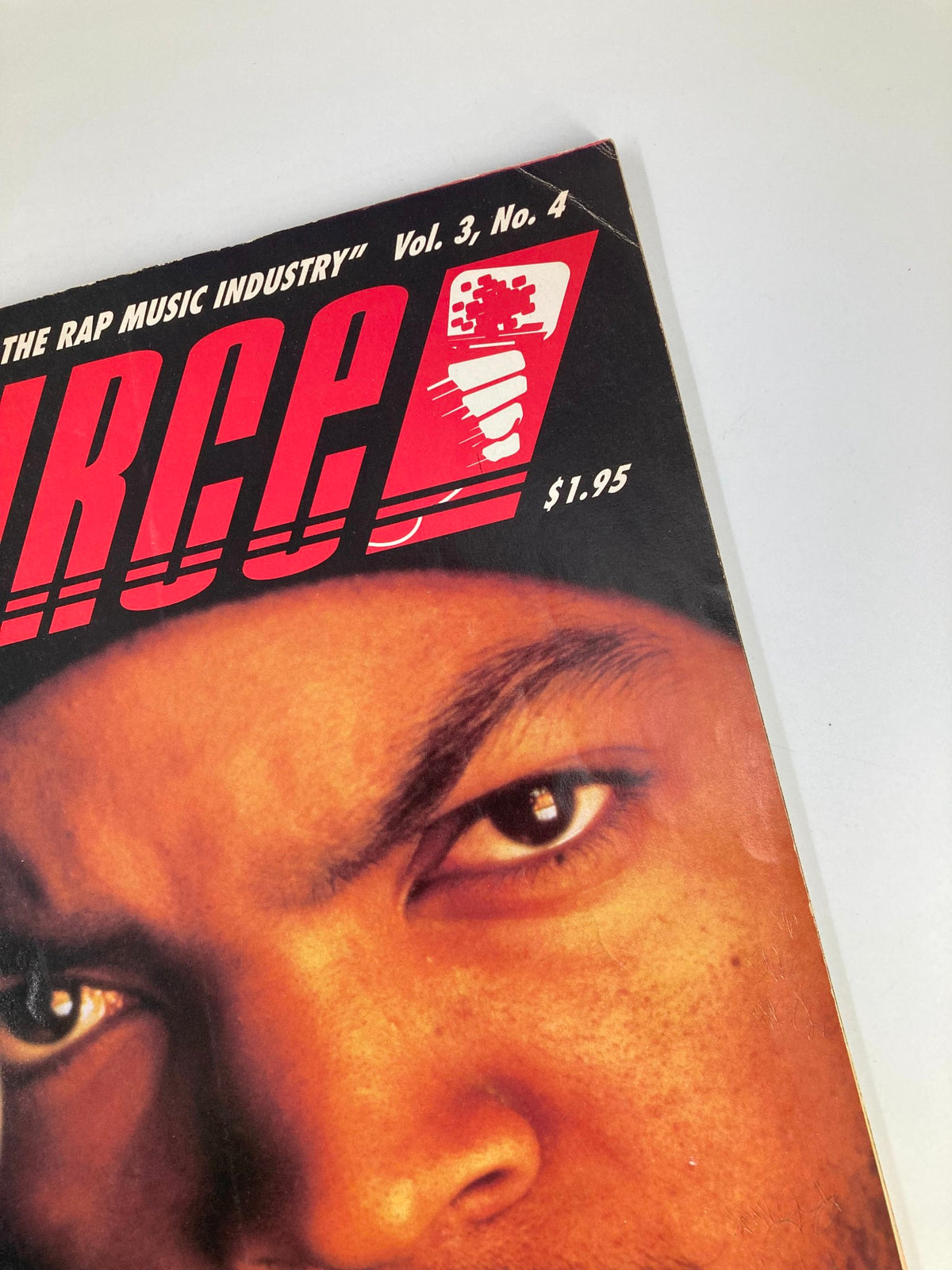 Cover of The Source Magazine Summer 1990 Vol 3 No. 4 featuring a close-up of Ice Cube's intense gaze, highlighting his significance in hip-hop culture.
