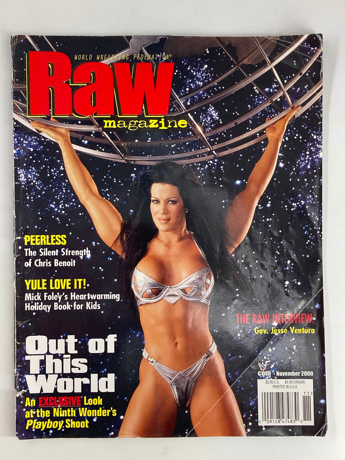 WWF Raw Magazine November 2000 featuring Chyna on the cover in a space-themed background, titled 'Out of this World'.