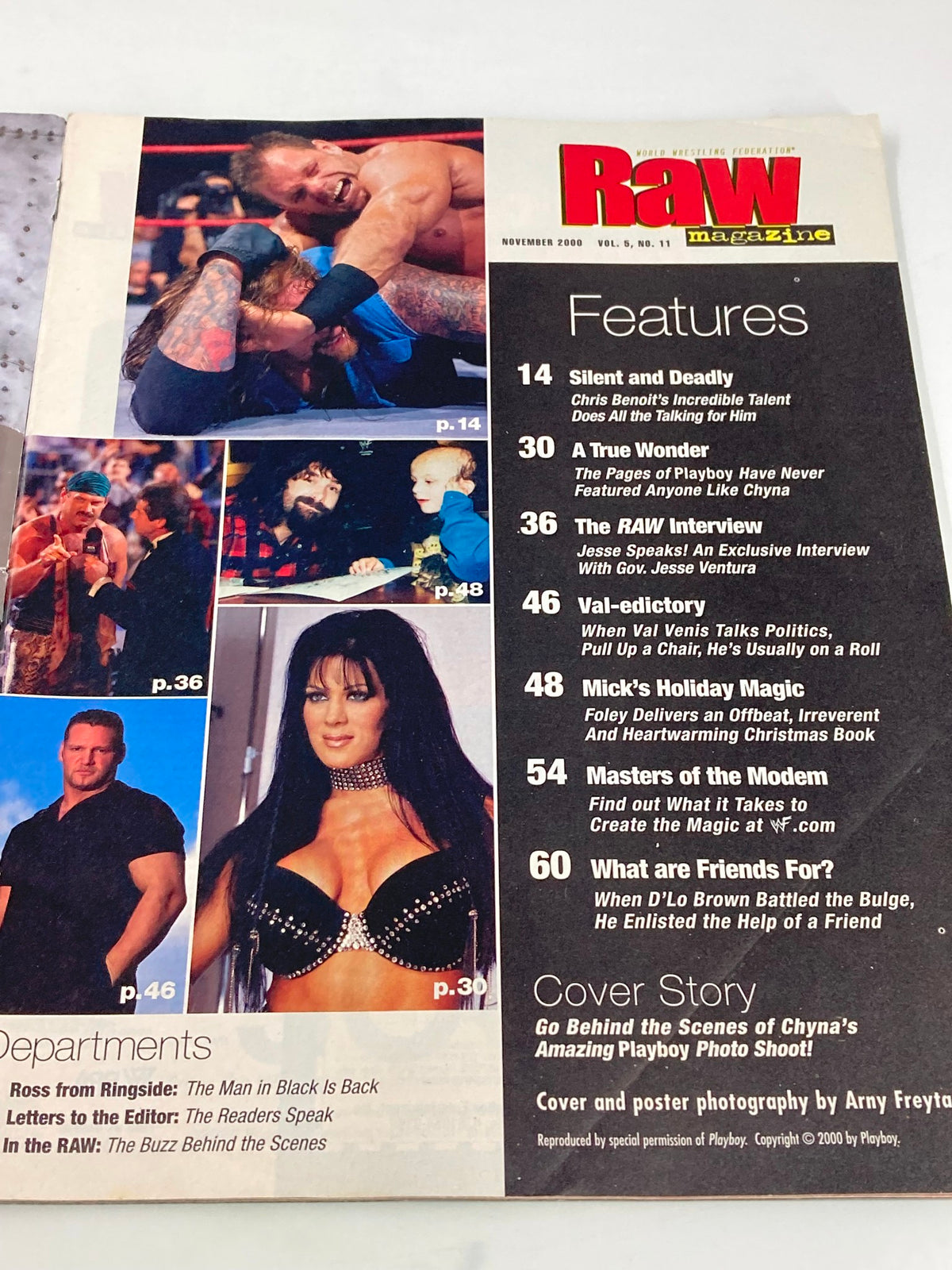 WWF Raw Magazine November 2000 featuring wrestling action shots, highlighting iconic moments from a pivotal time in wrestling history.
