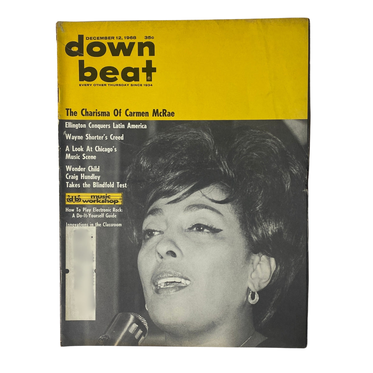 Down Beat Magazine December 12, 1968, featuring Carmen McRae on the cover showcasing her charisma, with headlines about jazz and articles on musicians.