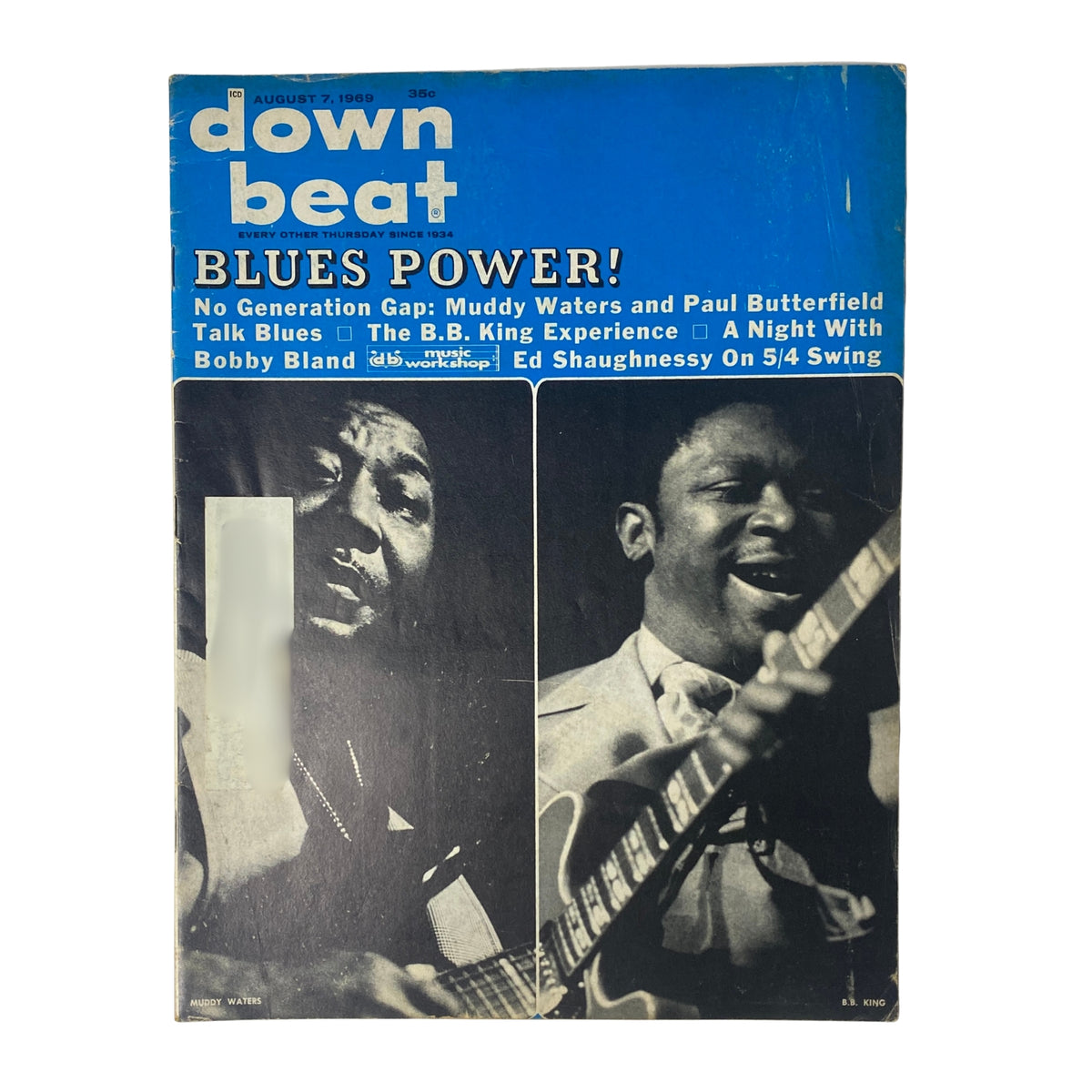 Down Beat Magazine cover from August 7, 1969, featuring Muddy Waters and Paul Butterfield, highlighting blues music and culture.