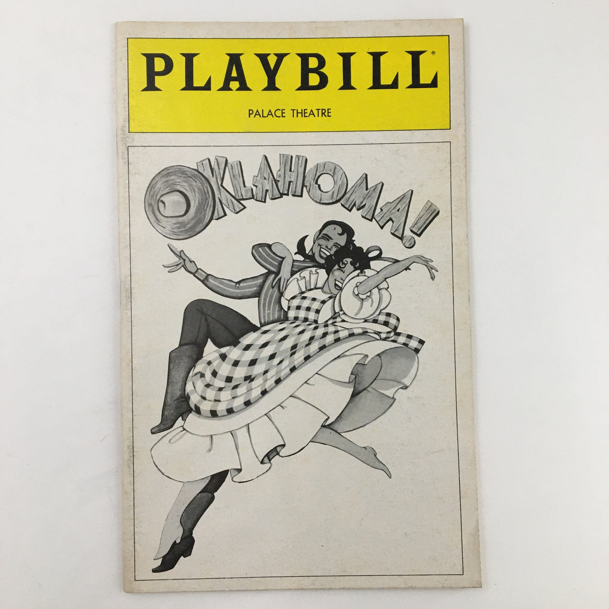 1980 Playbill from The Palace Theatre for Rodgers and Hammerstein's Oklahoma featuring a cover illustration of dancers.