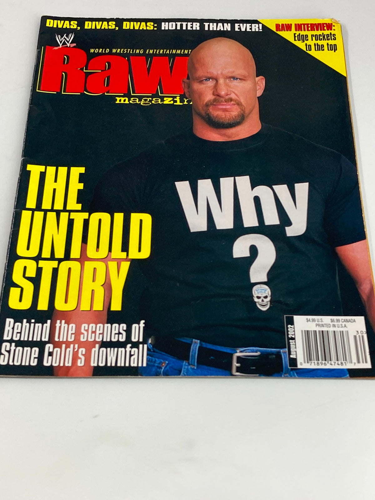 Close-up view of WWE Raw Magazine August 2002 cover, highlighting Steve Austin with the title 'The Untold Story' and his iconic statement 'Why?'. A great collectible for wrestling fans.