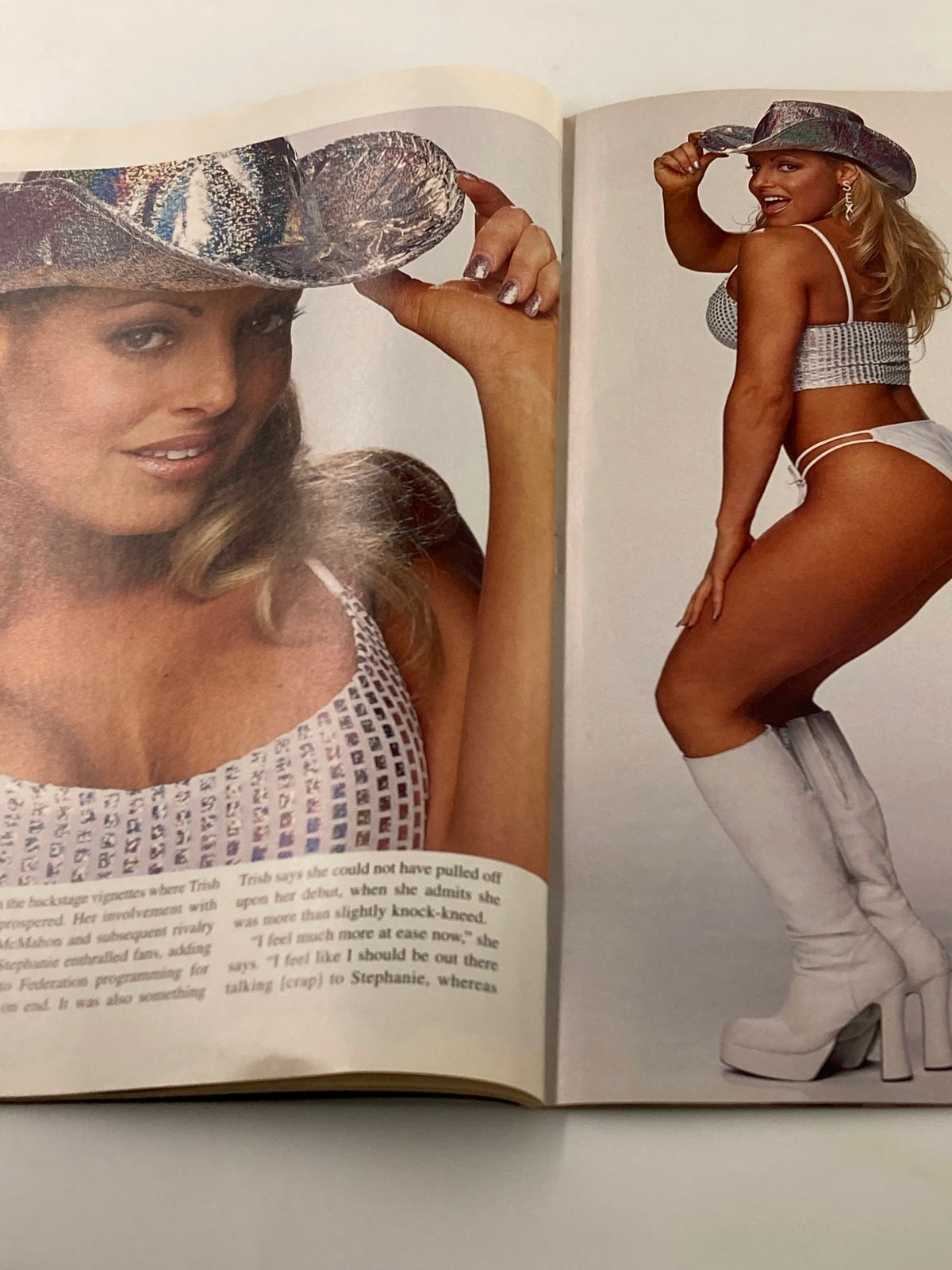 WWF Raw Magazine April 2001 depicting Trish Stratus in a sparkling outfit, capturing her charisma and influence as a leading figure in WWE history.