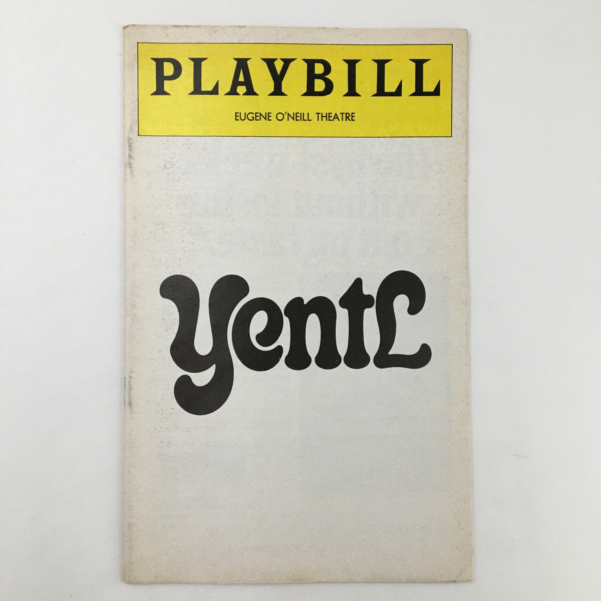 1975 Playbill for Yentl at Eugene O'Neill Theatre, highlighting the bold typography and iconic yellow header.