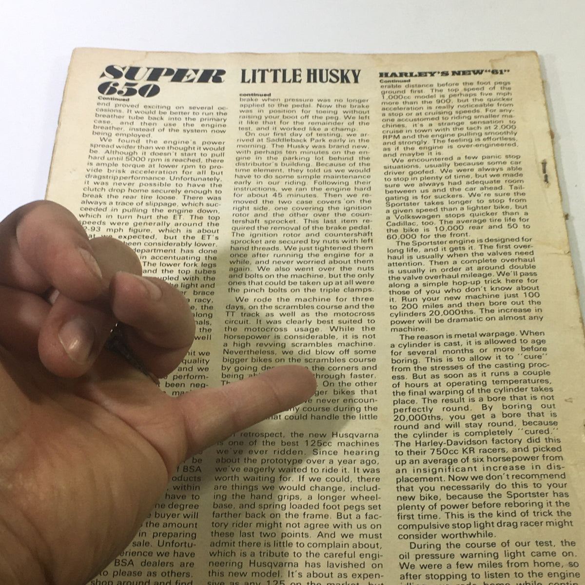 Inside page of the Vintage Cycle Guide Magazine from 1972, detailing an article titled 'Little Husky.' The page features technical insights on performance and design, capturing the essence of motorcycle culture in the early 70s.